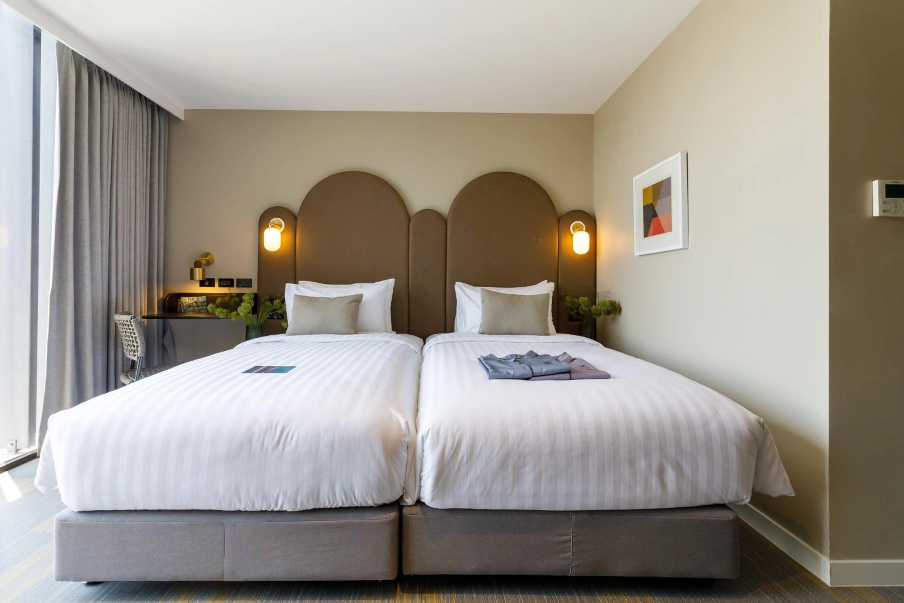 Bed in Benjarong Hotel Bangkok Ratchada