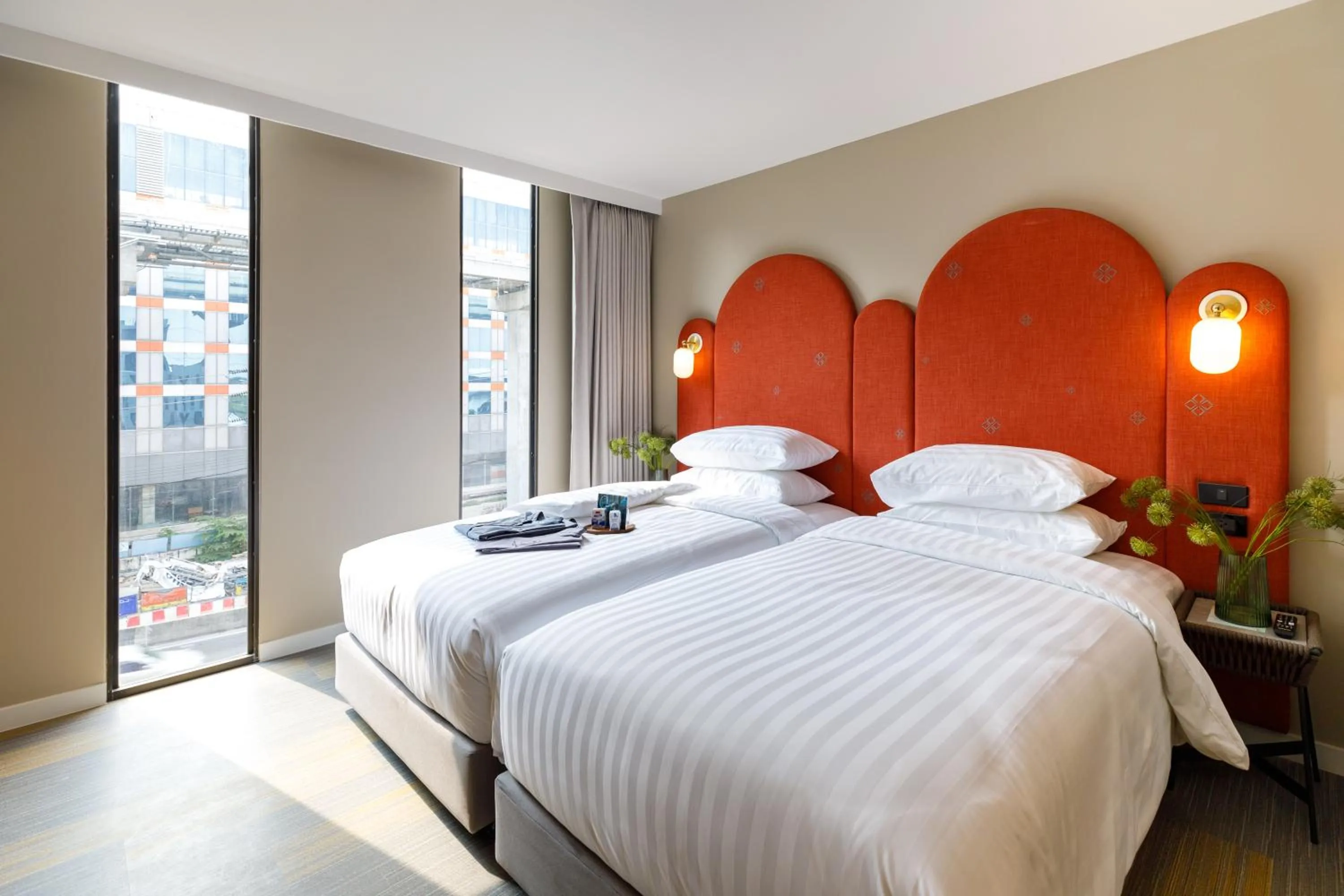 Bed in Benjarong Hotel Bangkok Ratchada