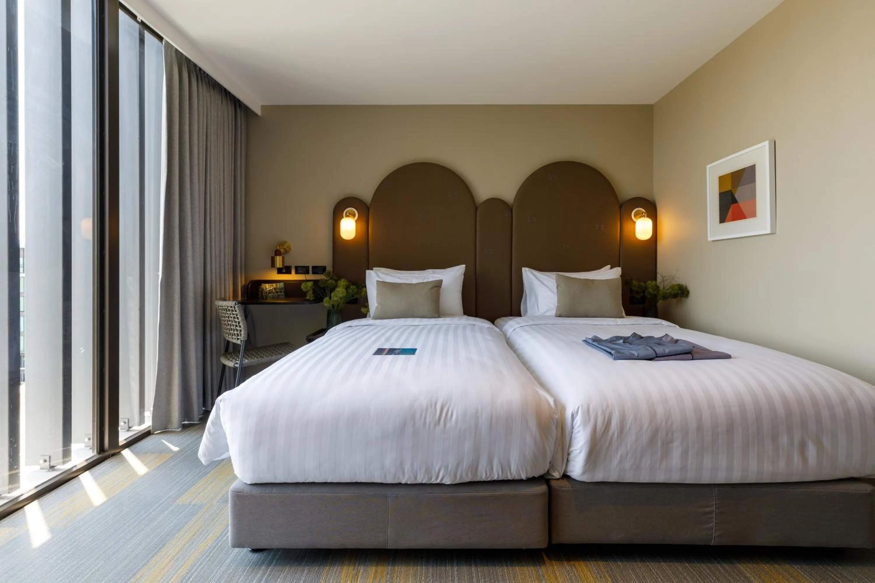 Bed in Benjarong Hotel Bangkok Ratchada