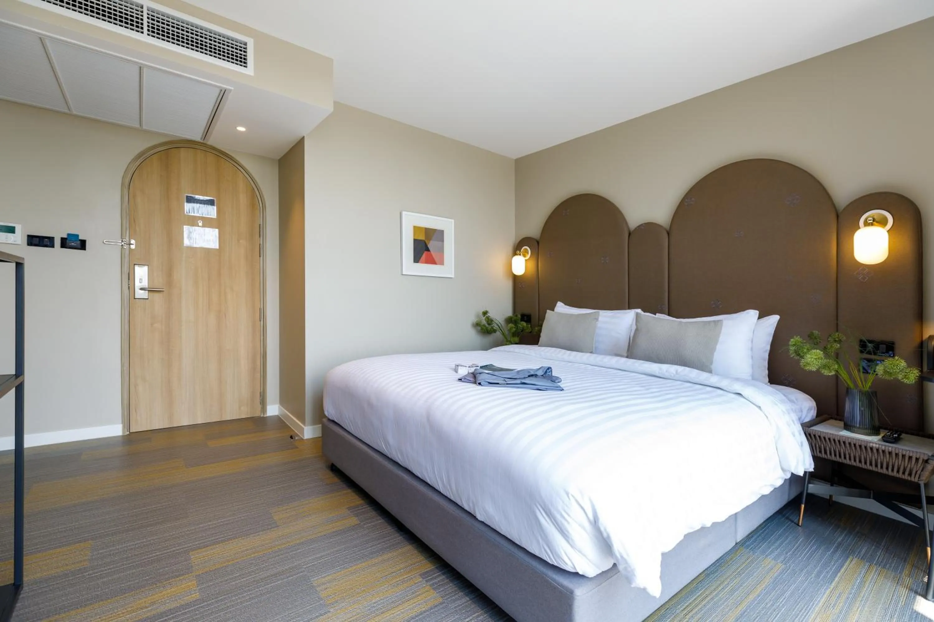 Bed in Benjarong Hotel Bangkok Ratchada