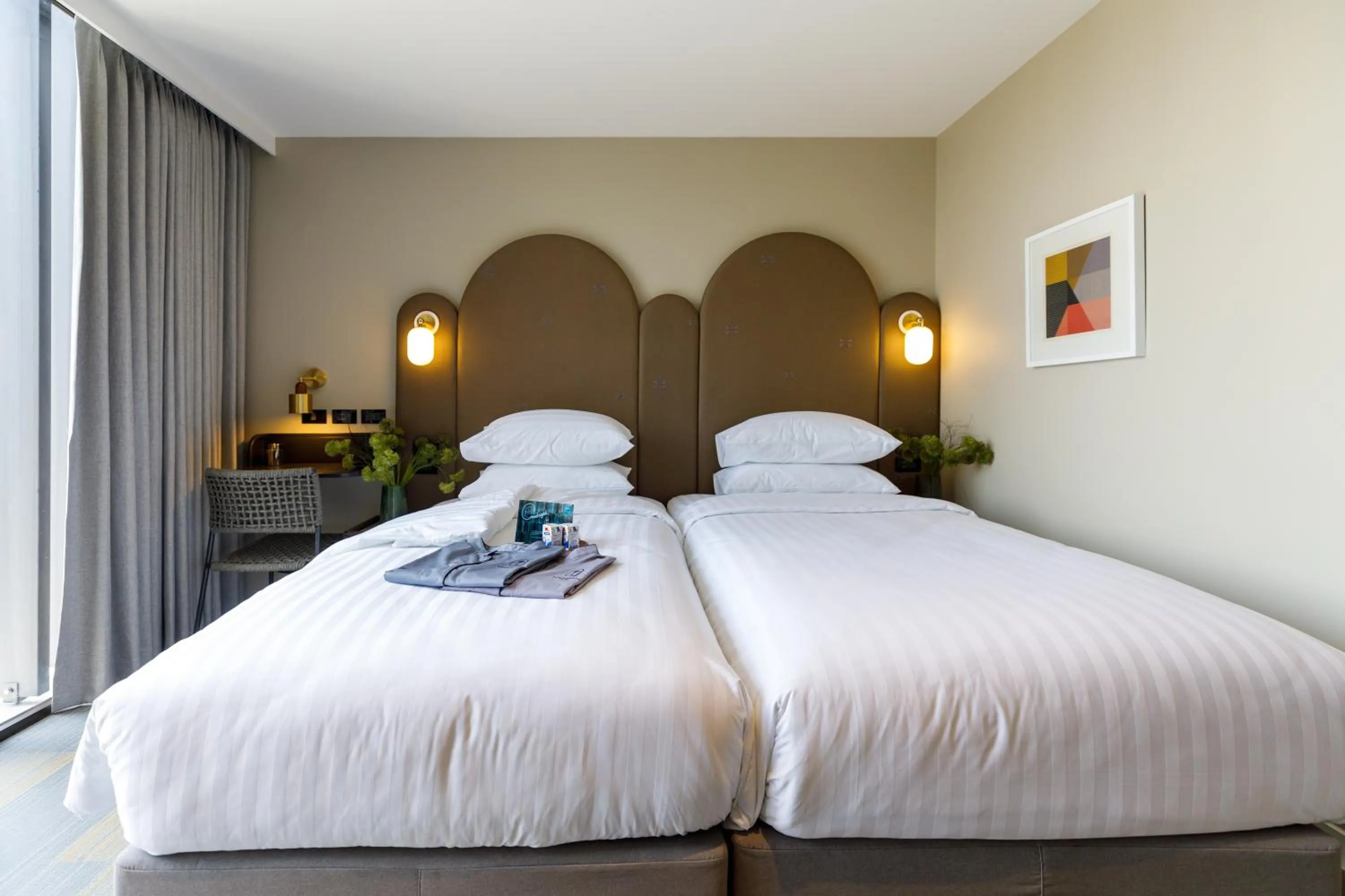 Bed in Benjarong Hotel Bangkok Ratchada