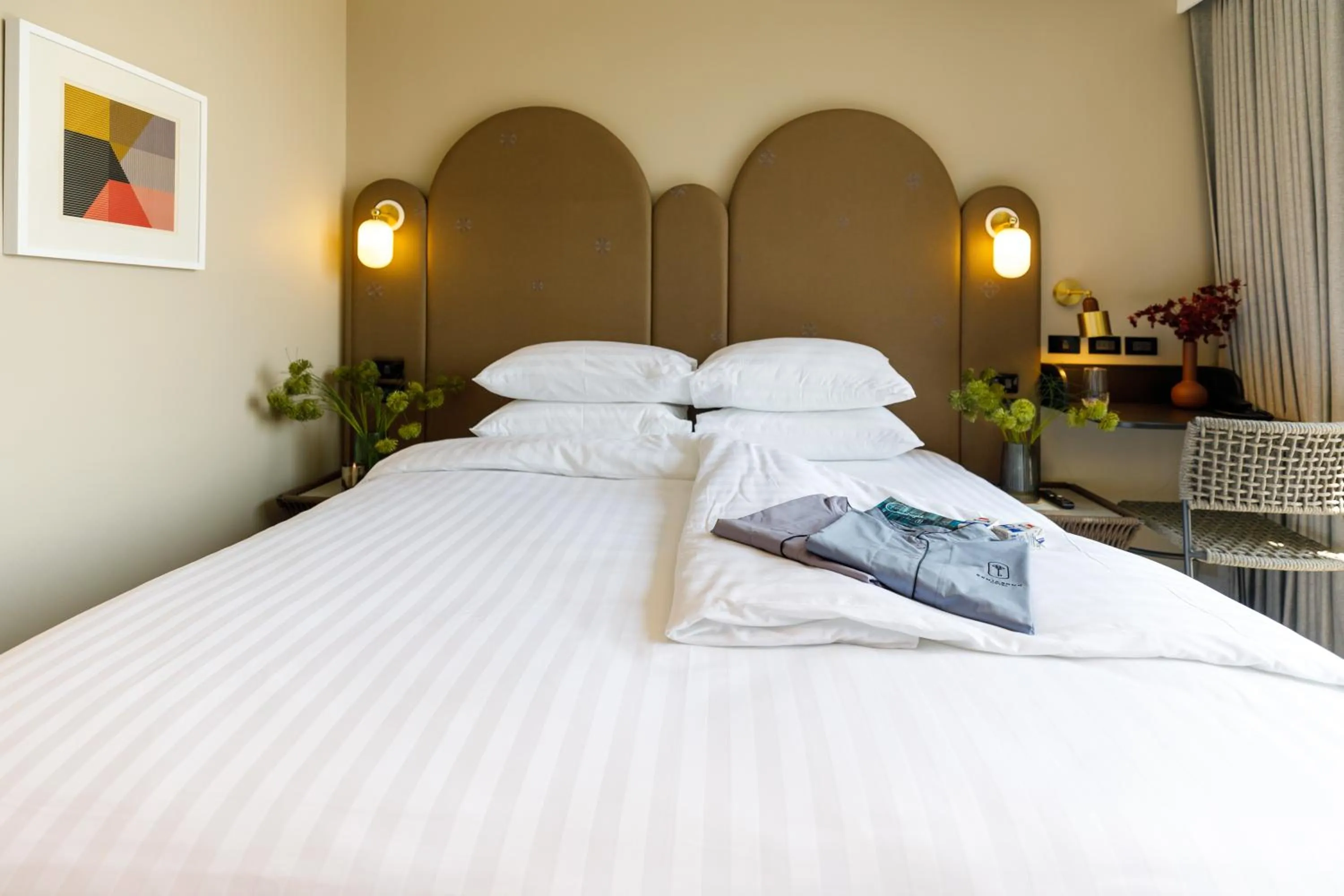 Bed in Benjarong Hotel Bangkok Ratchada