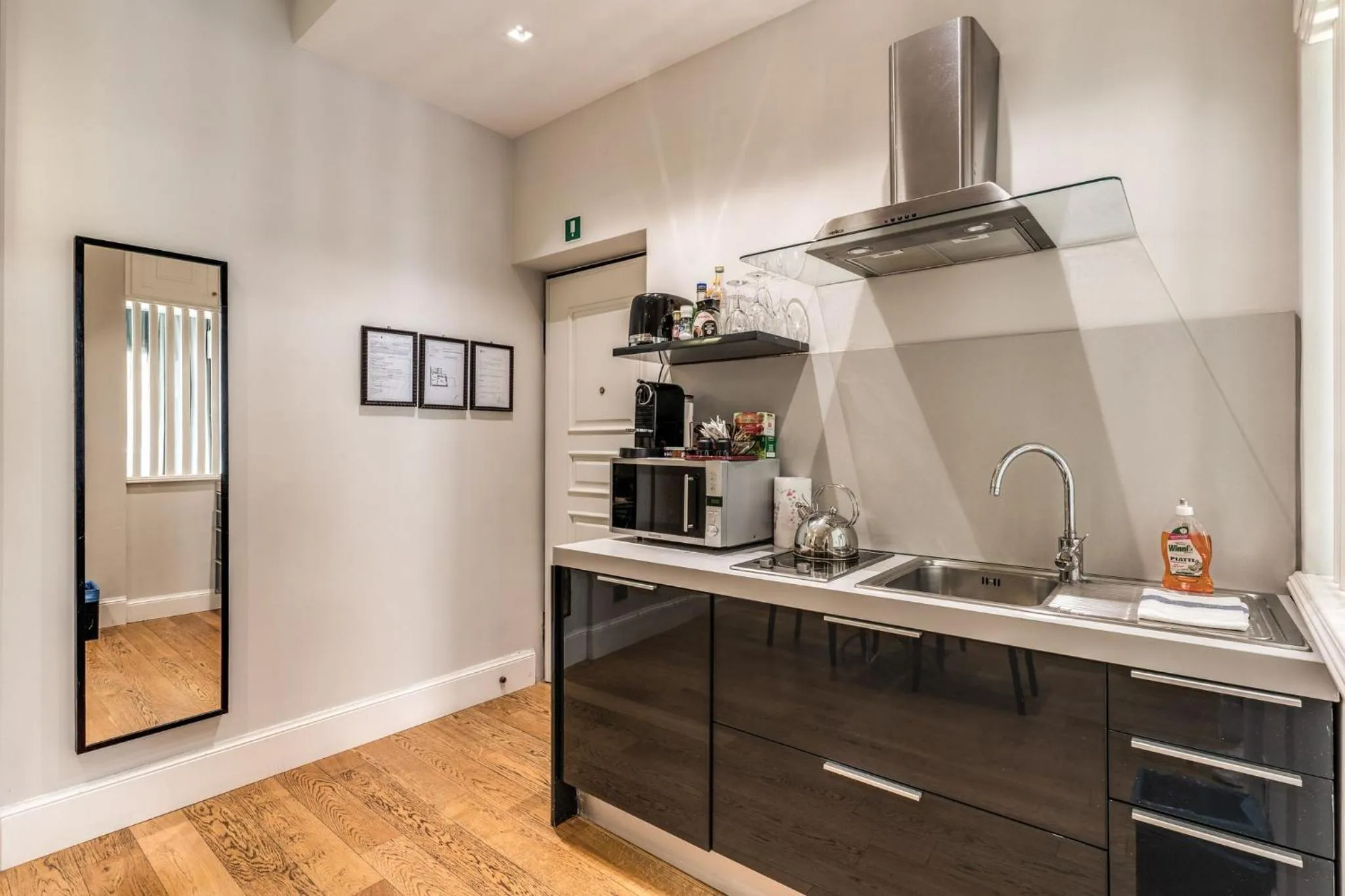 Kitchen or kitchenette in Via Napoli Apartments