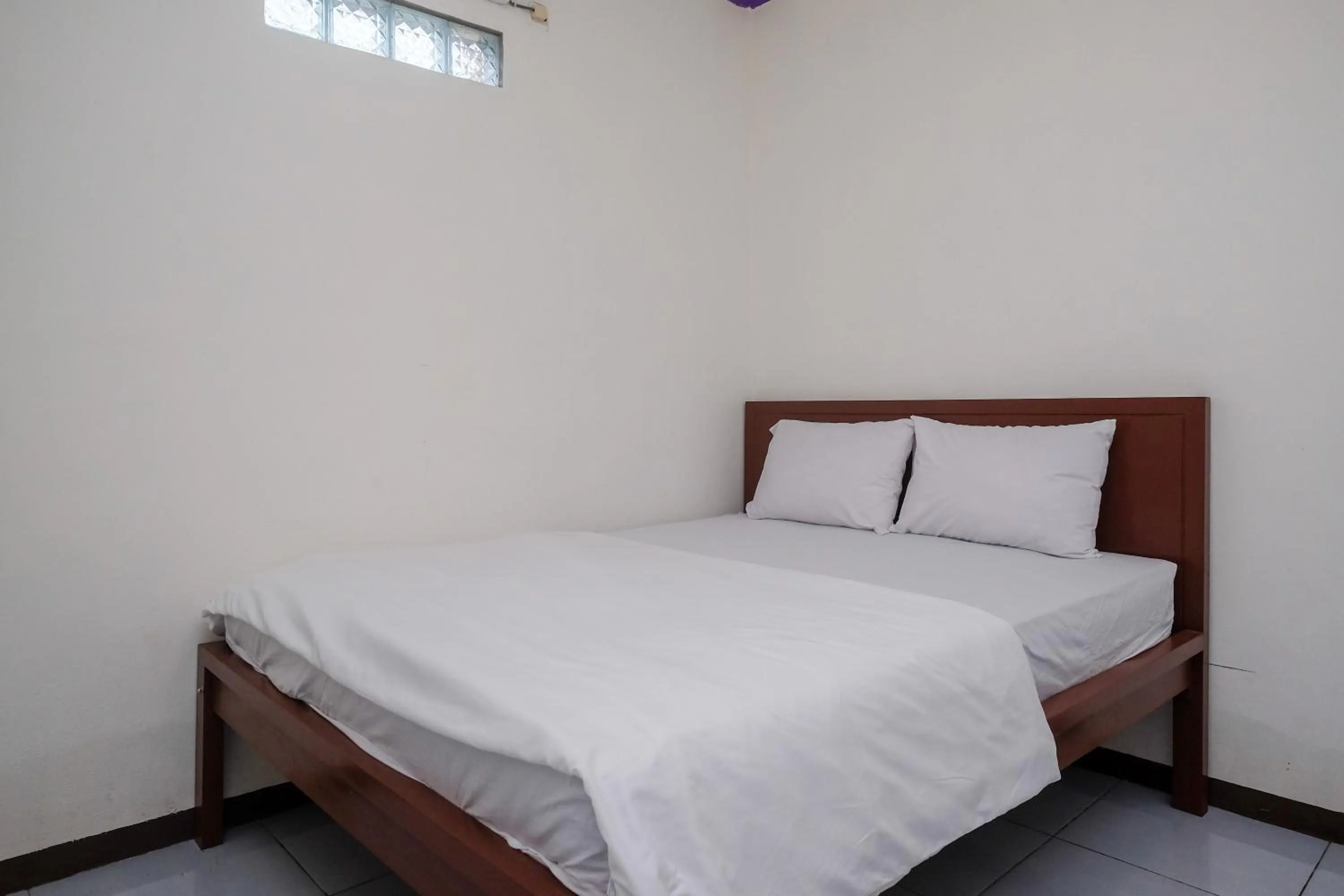 Bedroom, Bed in Urbanview Syariah Zidney 3 Salatiga by RedDoorz