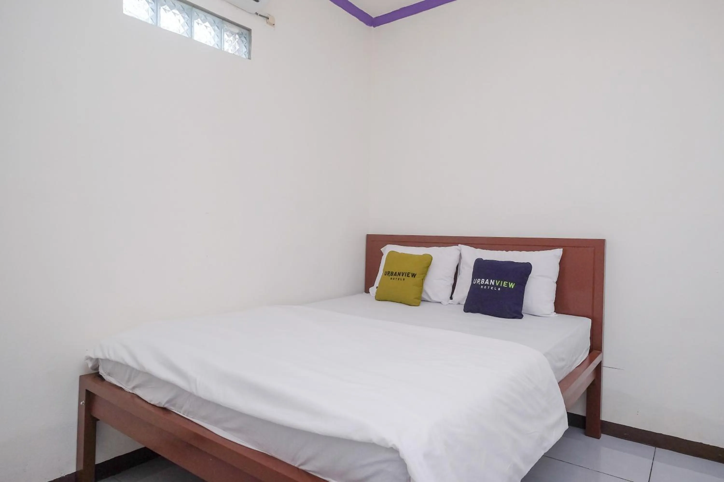 Bedroom, Bed in Urbanview Syariah Zidney 3 Salatiga by RedDoorz