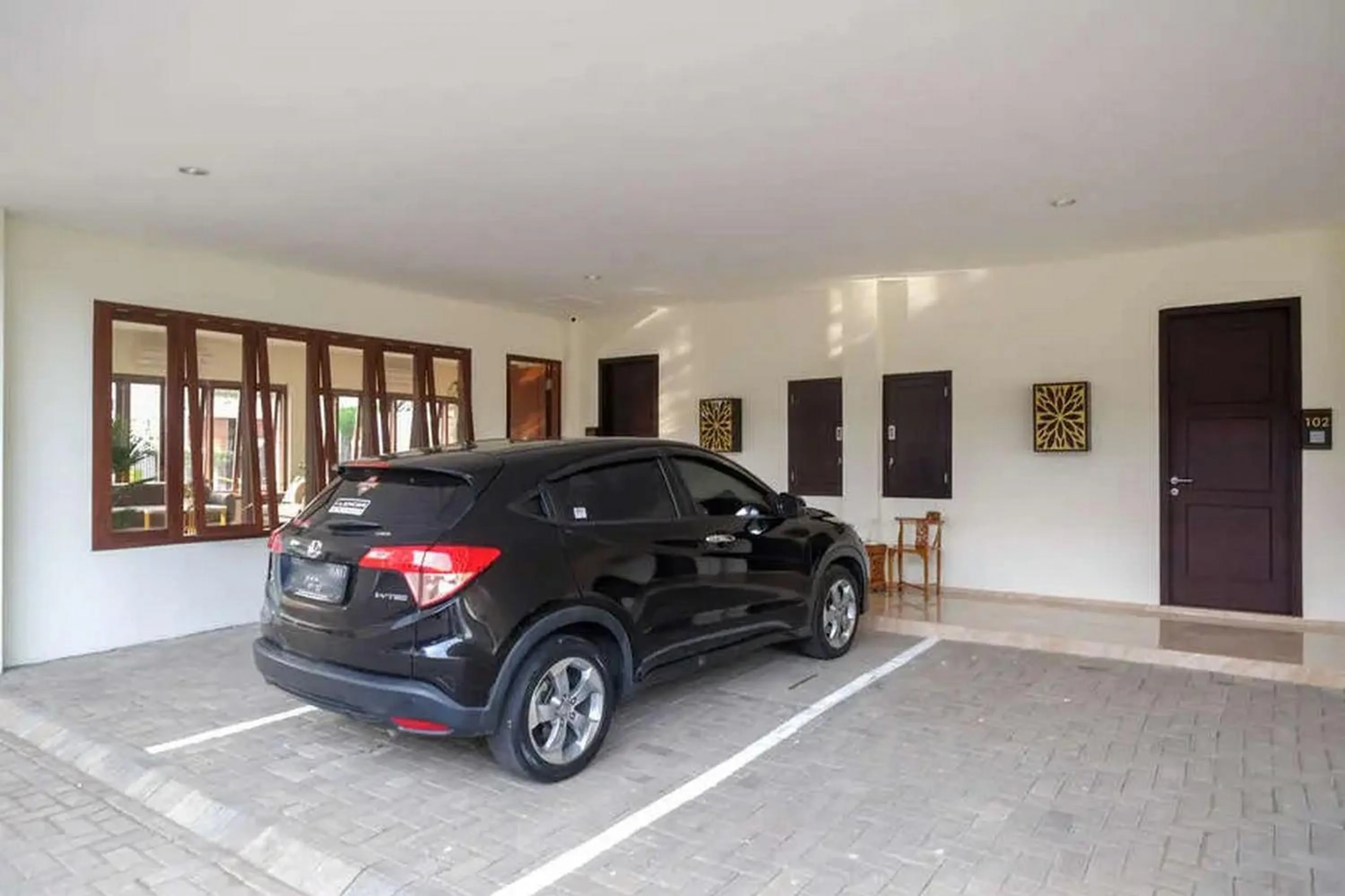 Parking in Urbanview Sumampir Anugrah Purwokerto by RedDoorz