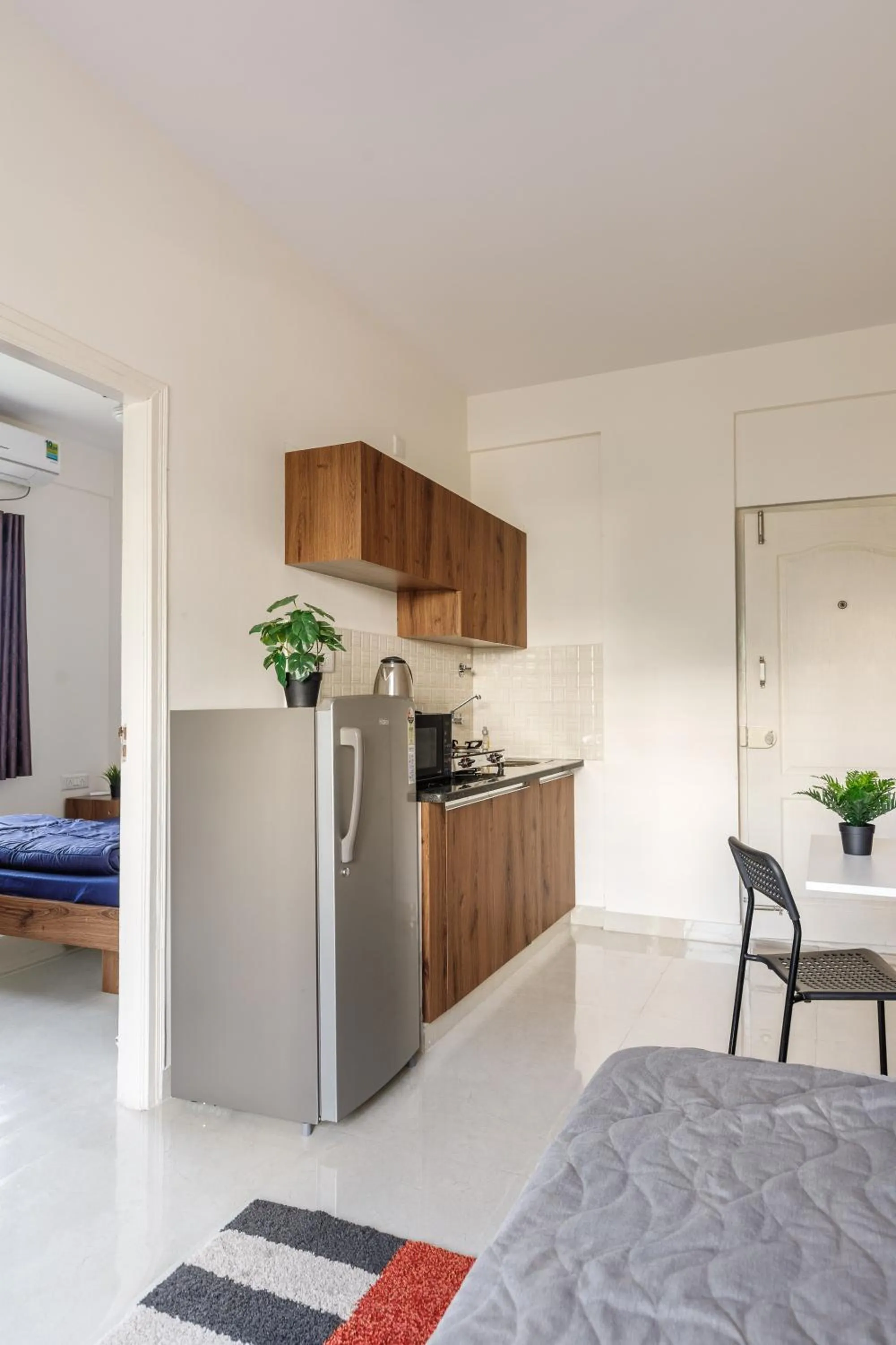 Bed in Sunrise Service Apartments