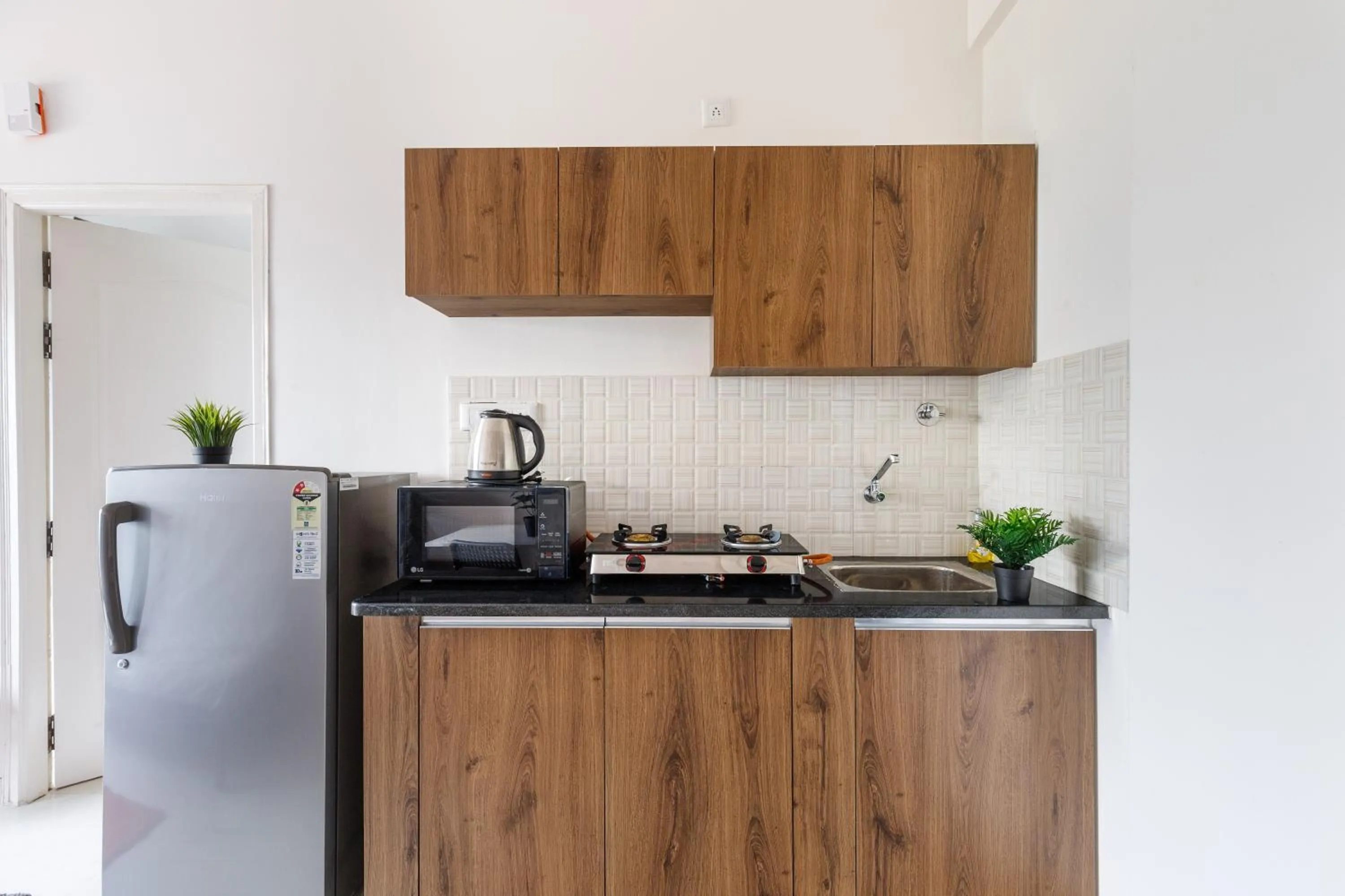 kitchen in Sunrise Service Apartments