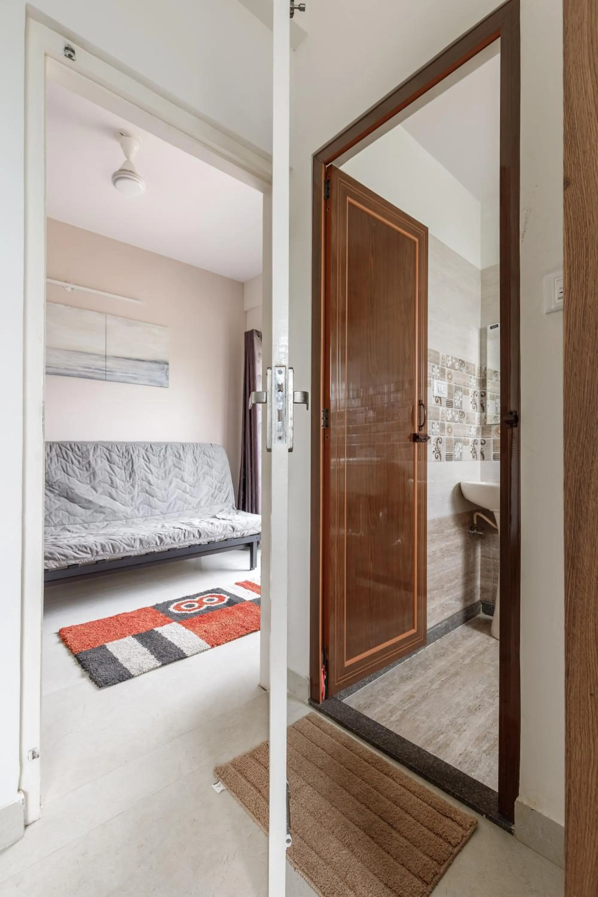 Bed in Sunrise Service Apartments