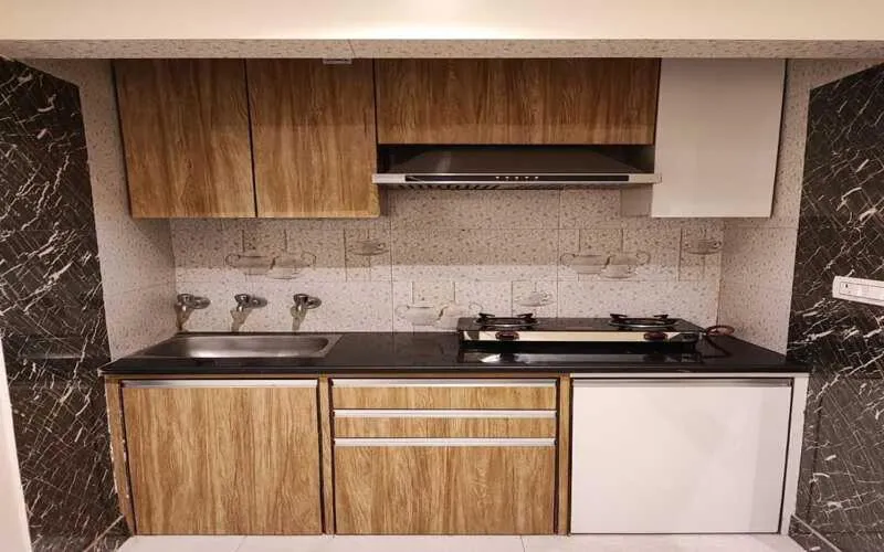 Kitchen or kitchenette in Sun Moon Residency and Apartments, Hotels in Rohini