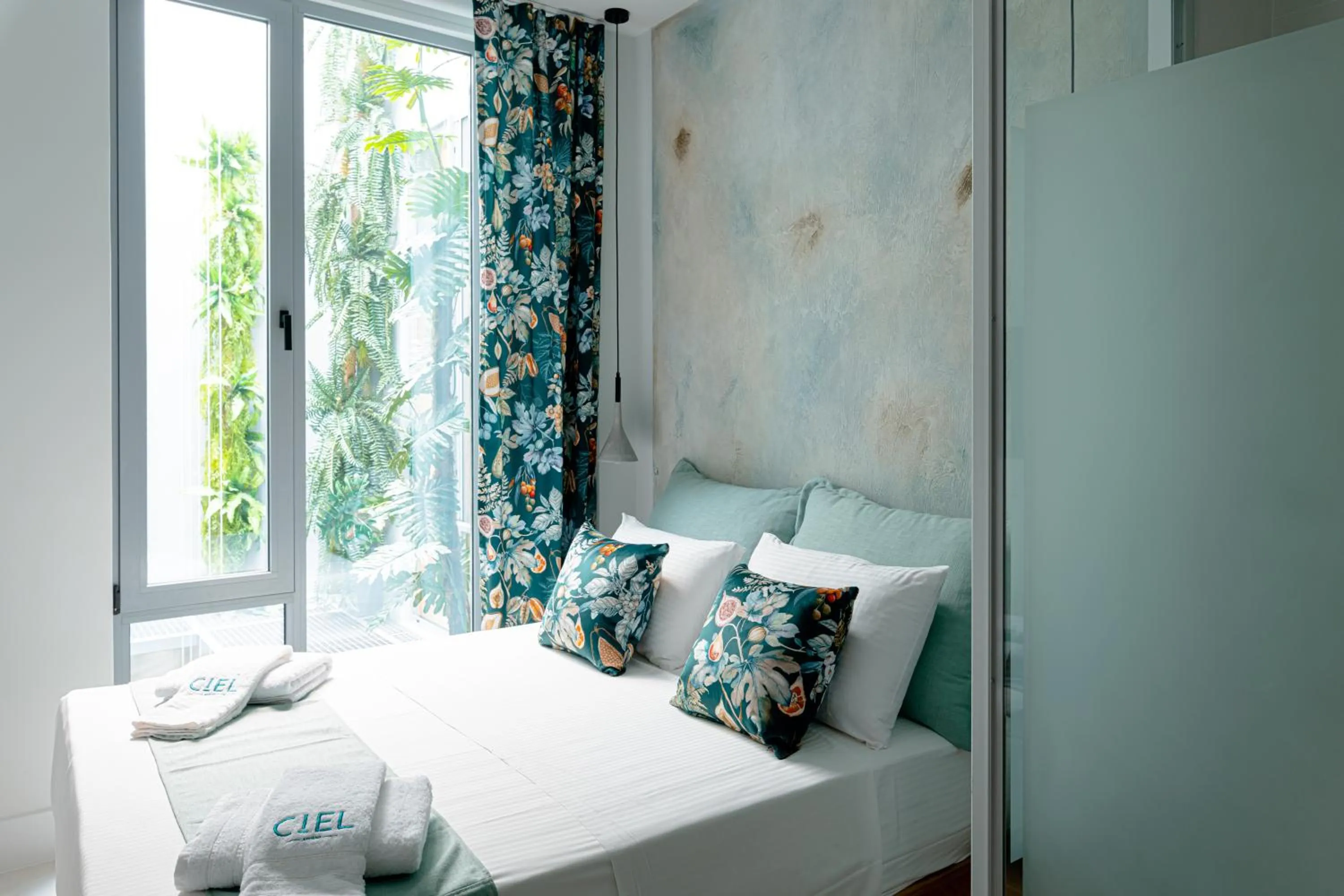 Bed in Ciel Suites Athens