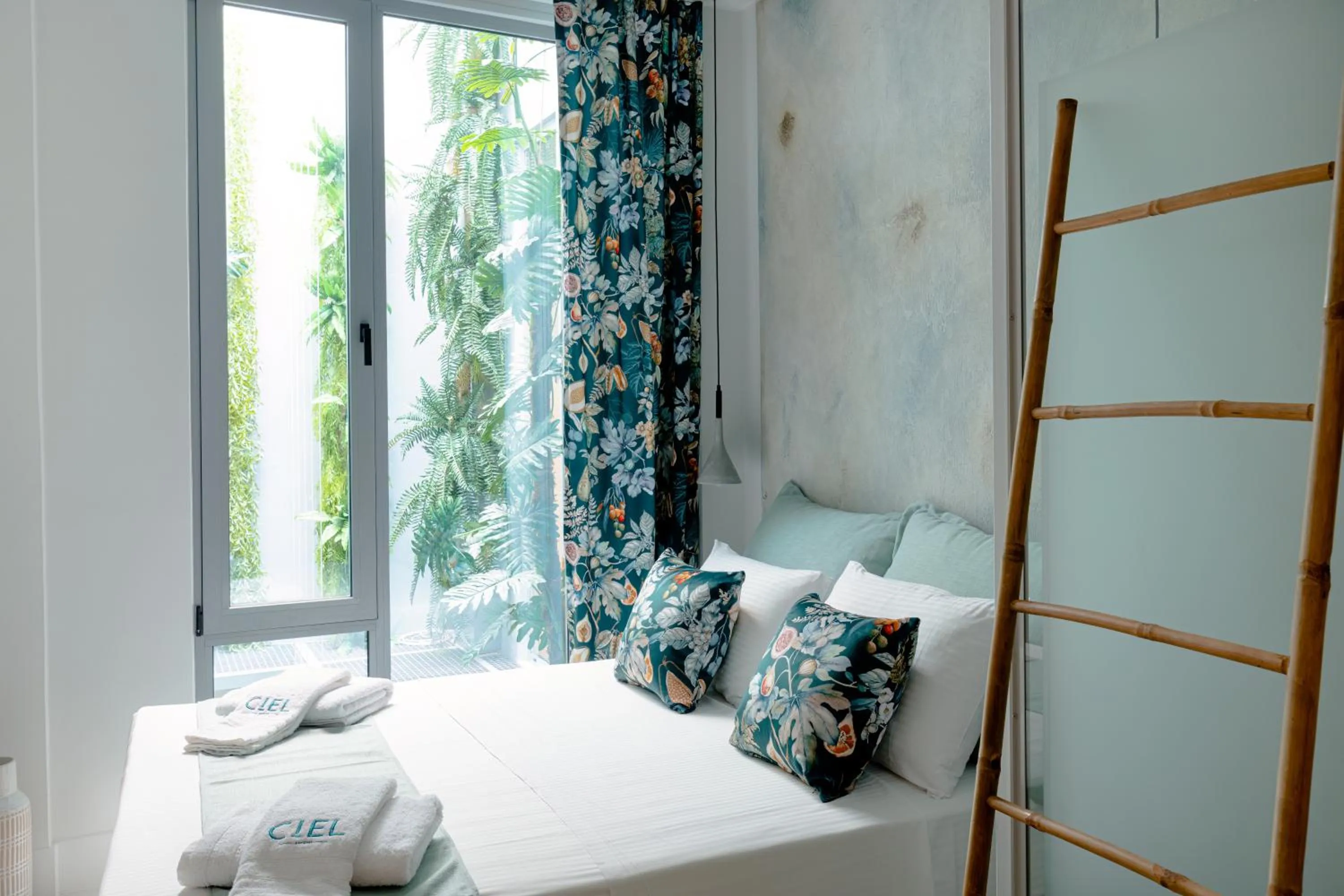 Bed in Ciel Suites Athens