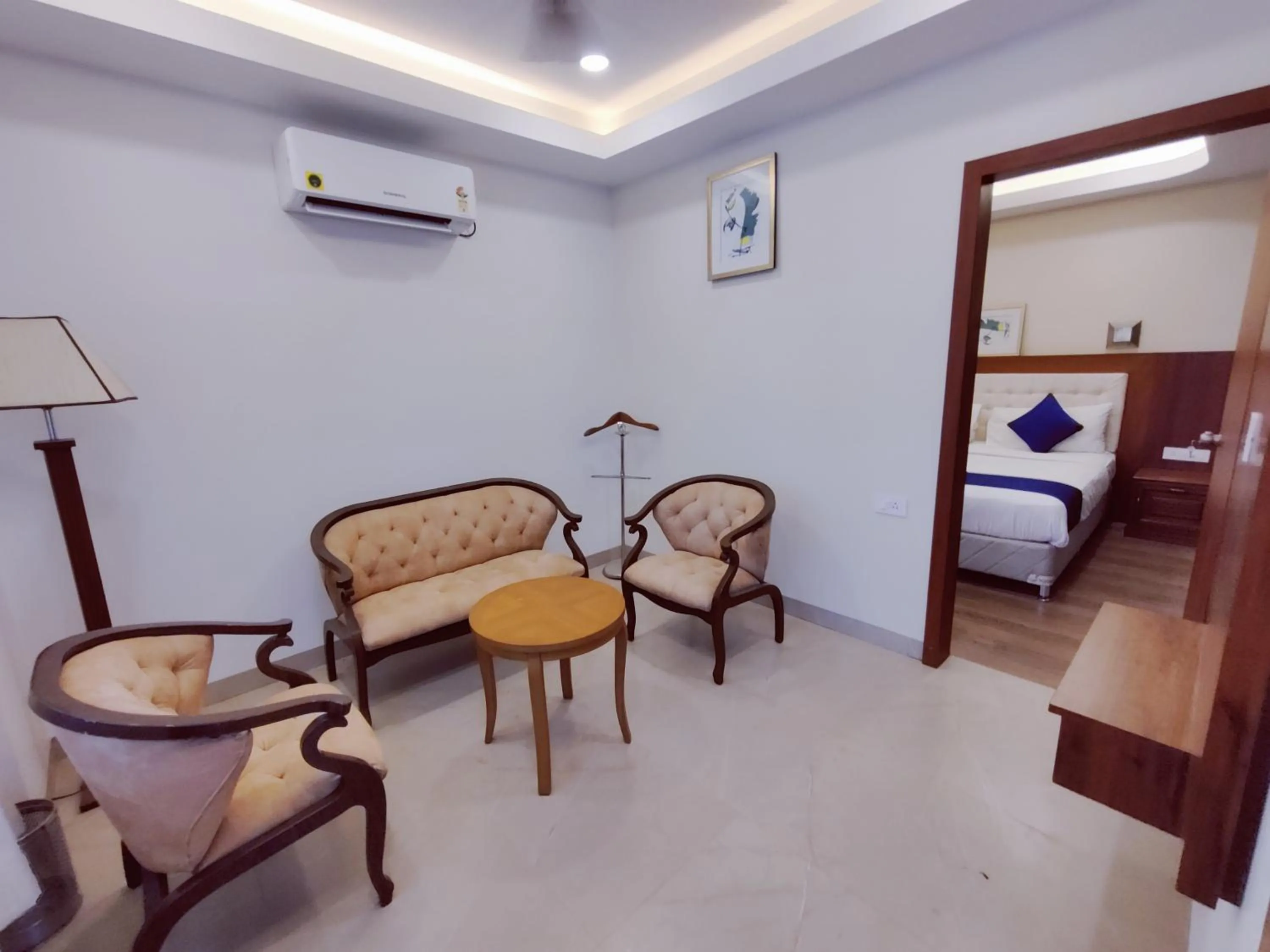 Seating area, Bed in Hotel The Prime