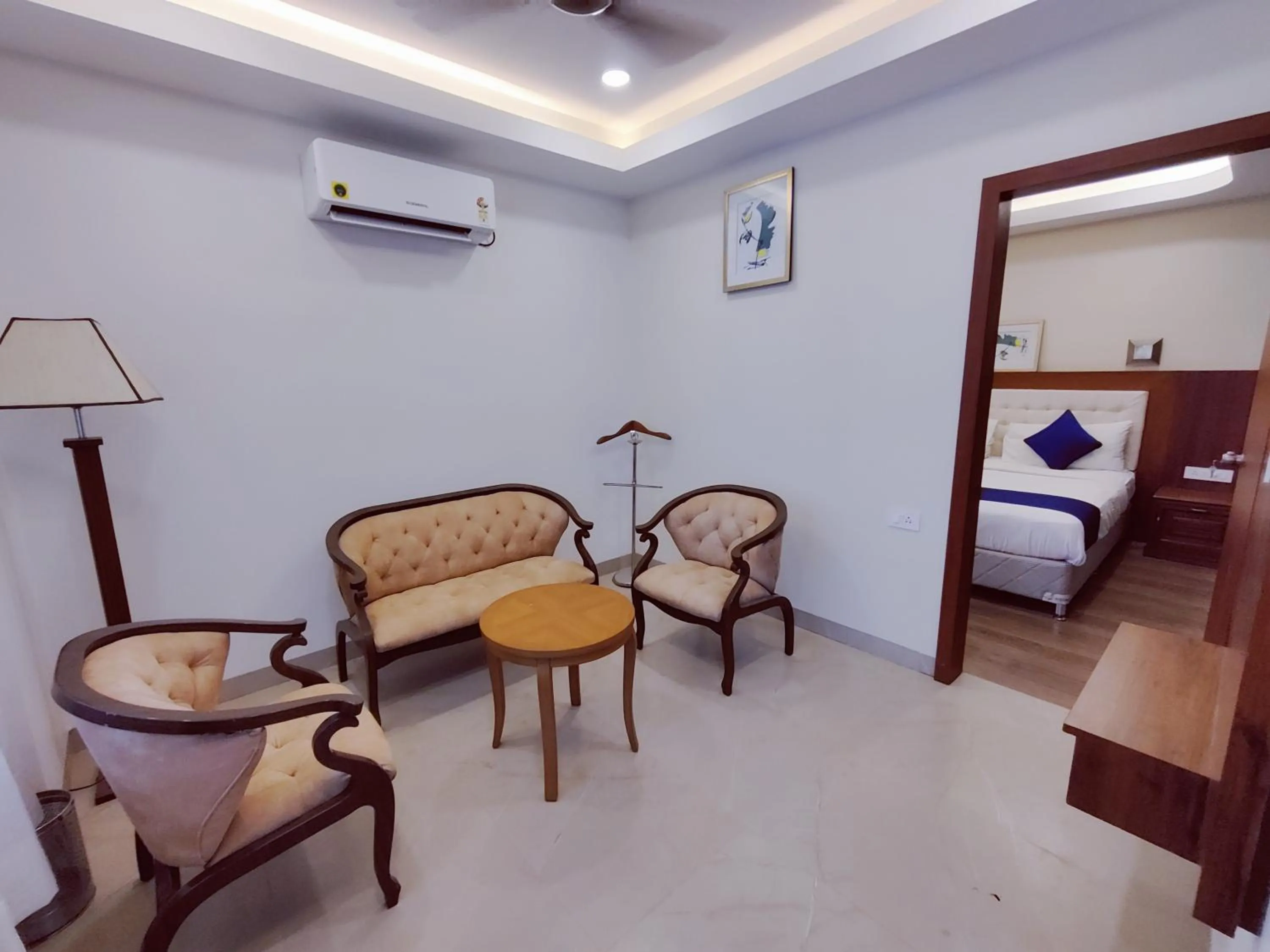 Seating area, Bed in Hotel The Prime