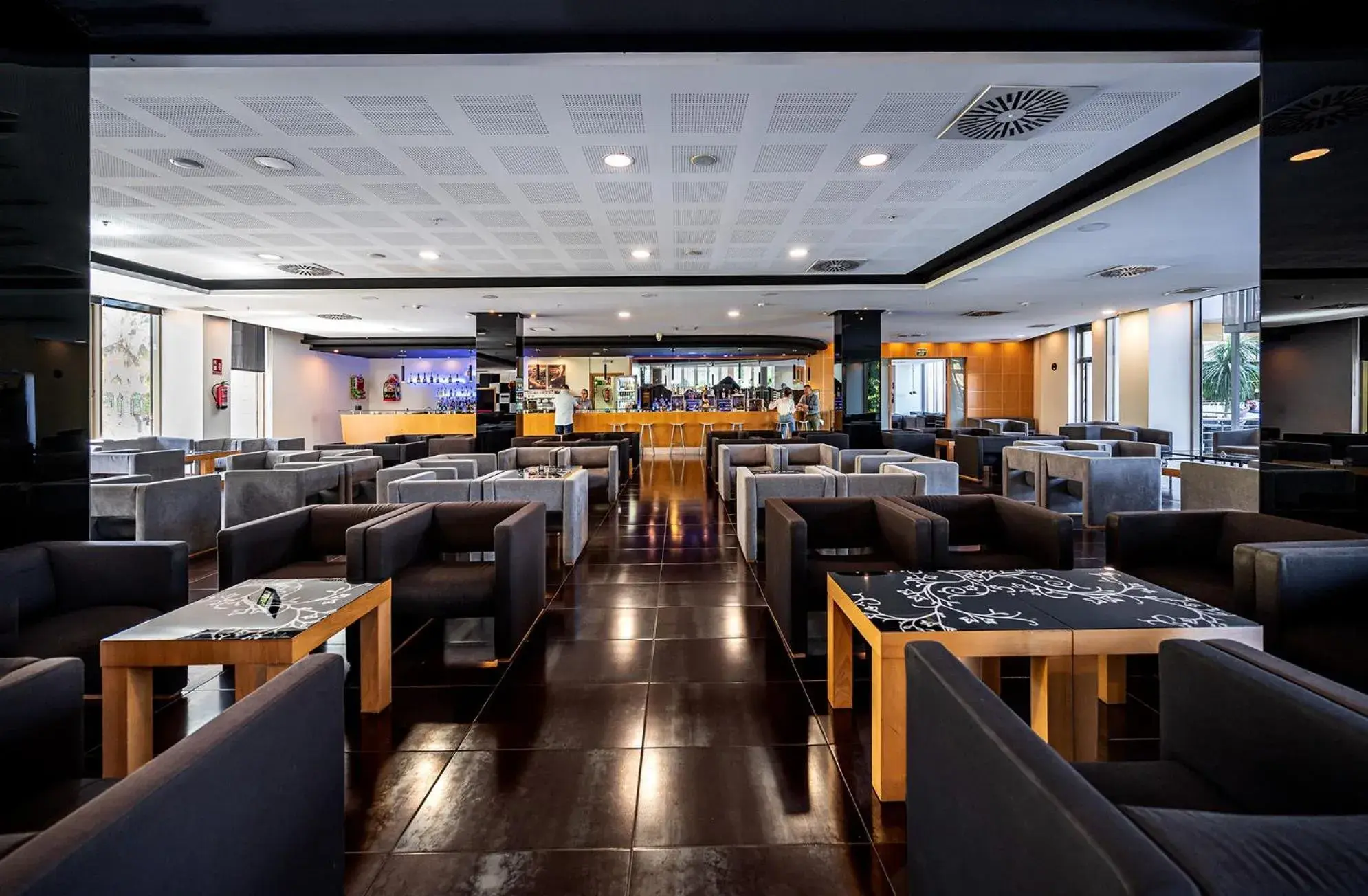 Lounge or bar in Albir Playa Hotel & Spa Lounge or bar in Albir Playa Hotel & Spa