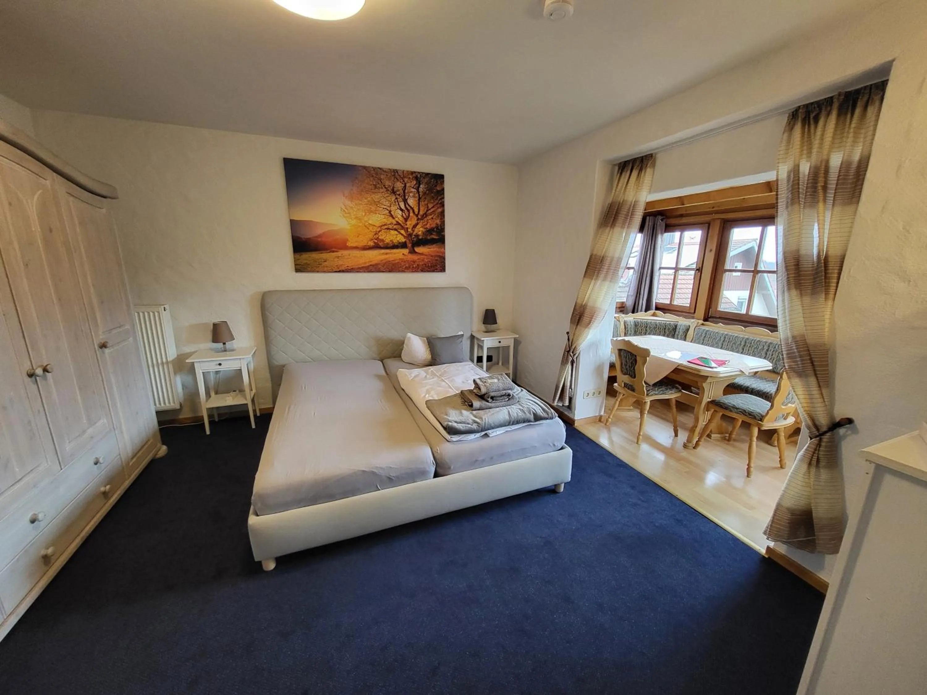 Seating area, Bed in Hotel Schönblick