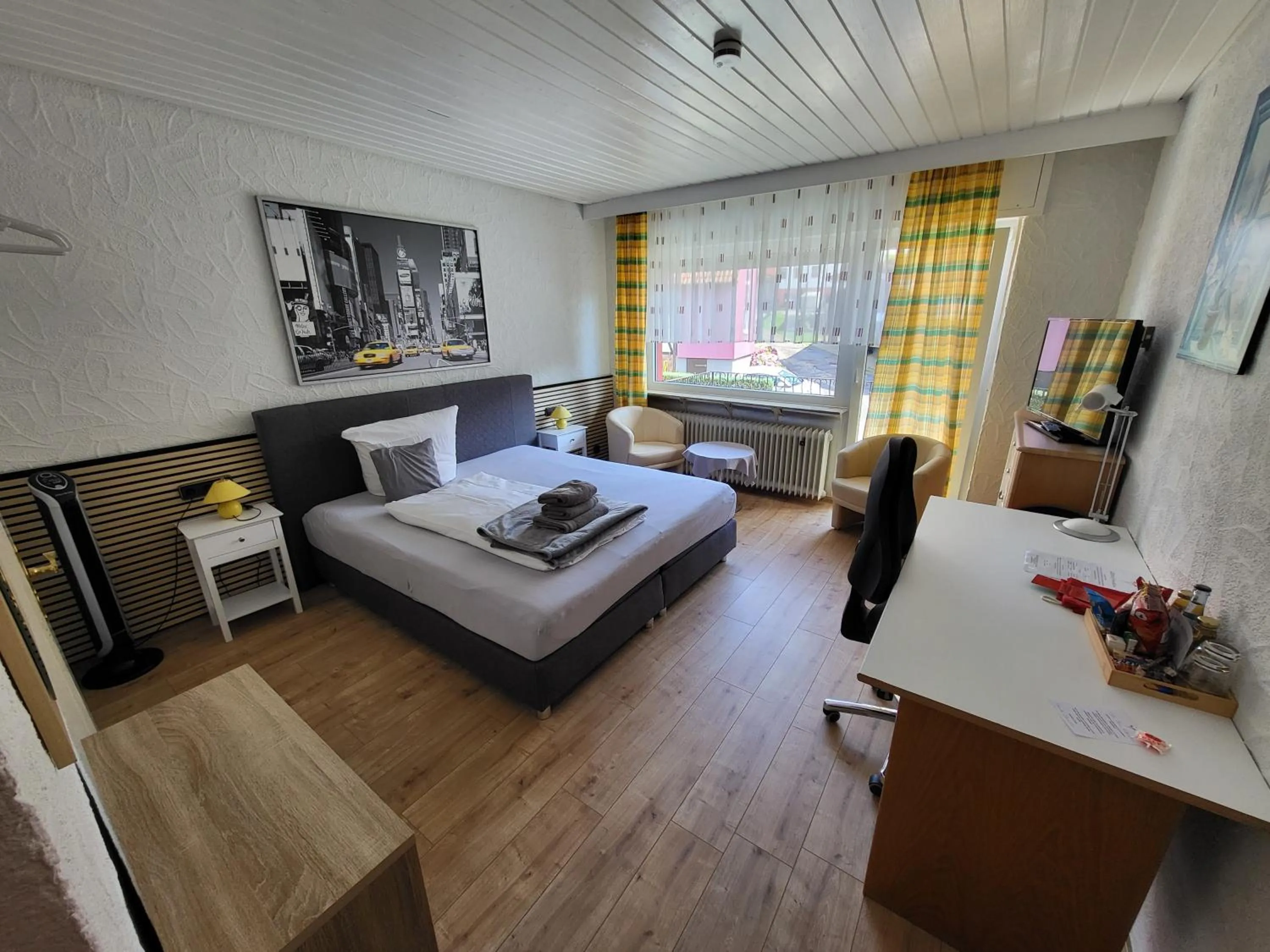 Seating area, Bed in Hotel Schönblick