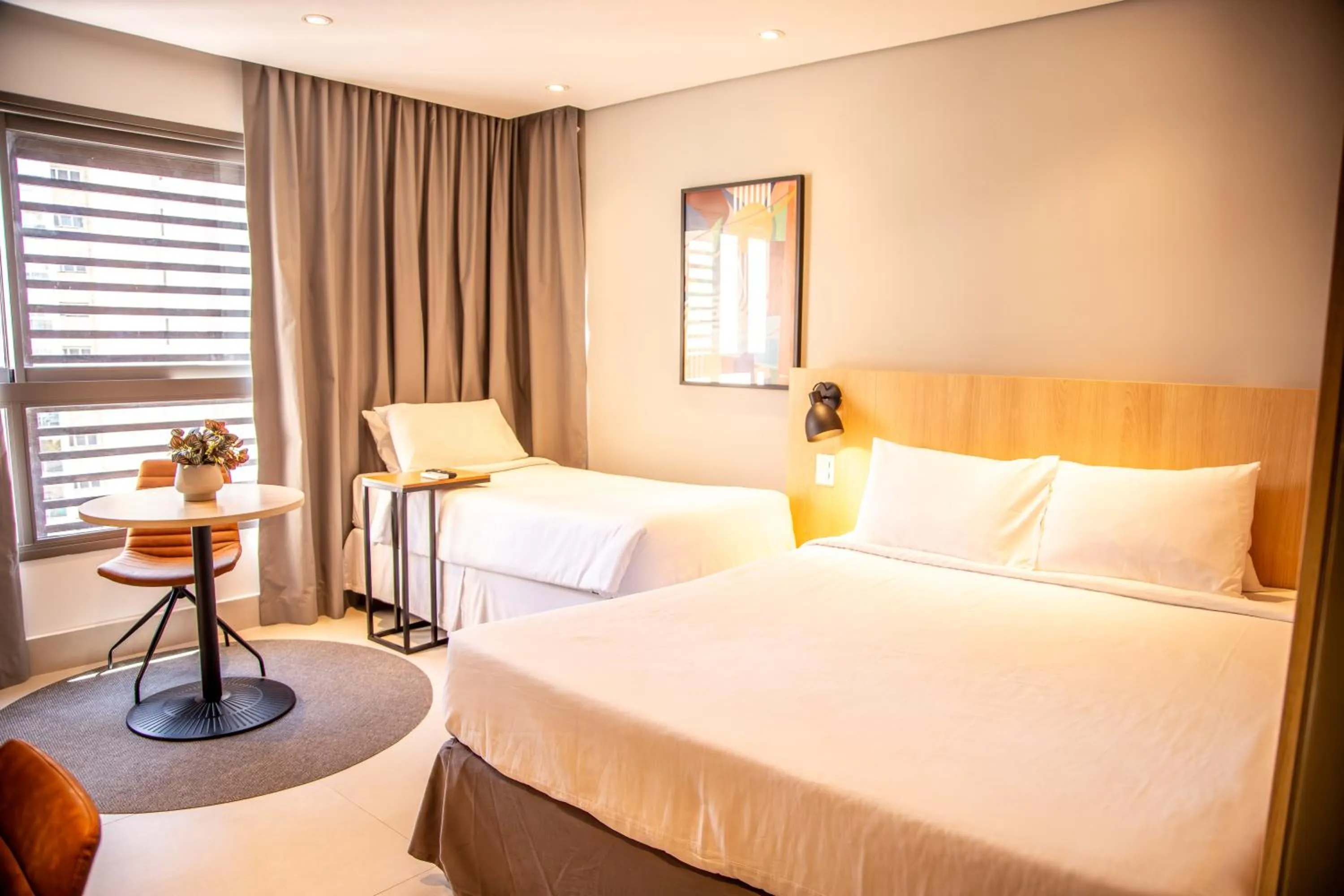 Bedroom, Bed in Cozzy Suites Paraíso Hotel