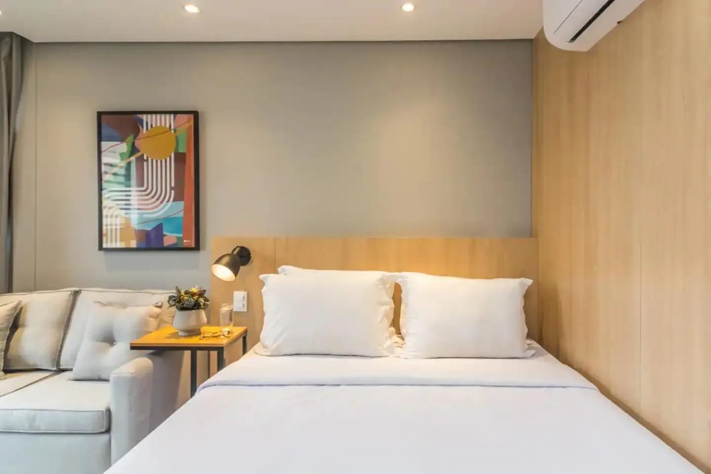 Bed in Cozzy Suites Paraíso Hotel