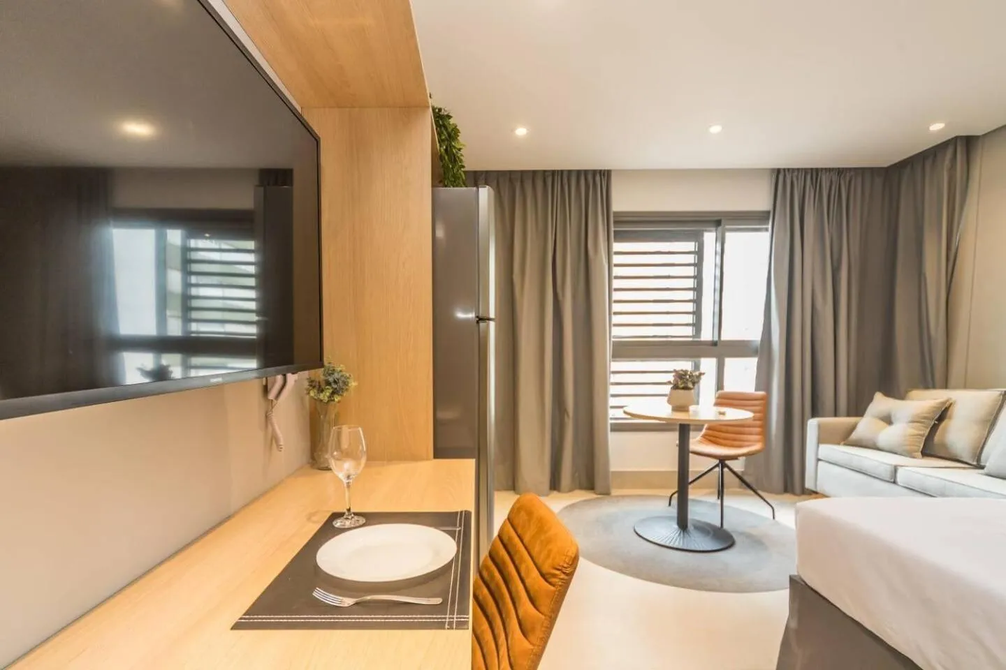 Living room, Bed in Cozzy Suites Paraíso Hotel