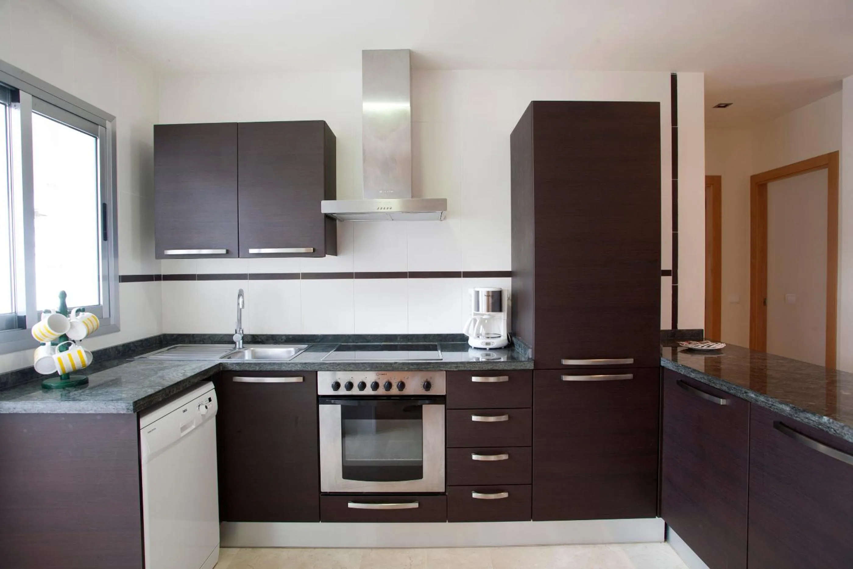 Kitchen or kitchenette in Complejo Bellavista Residencial