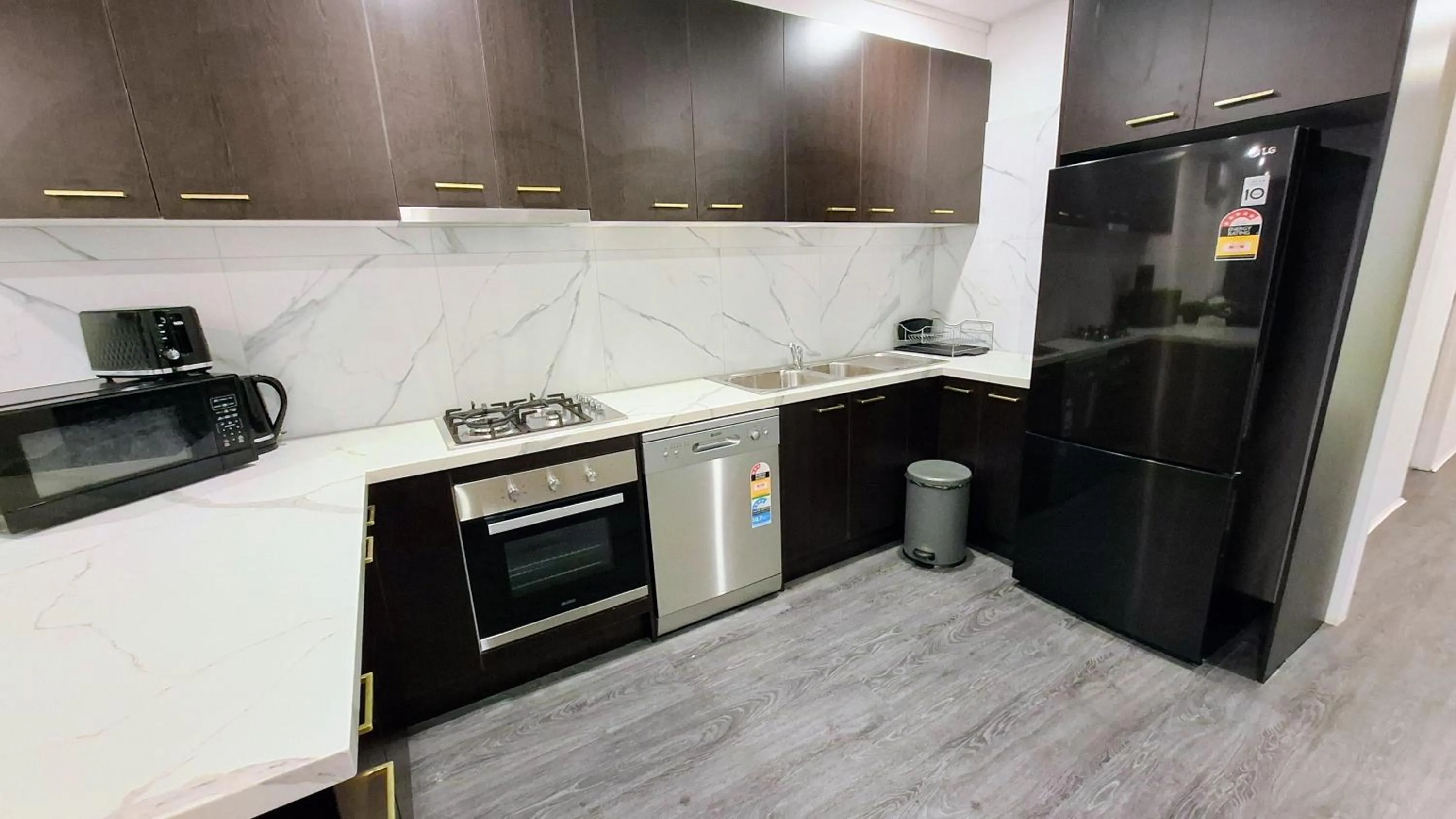 Kitchen or kitchenette in Exodus Dandenong Apartment Hotel