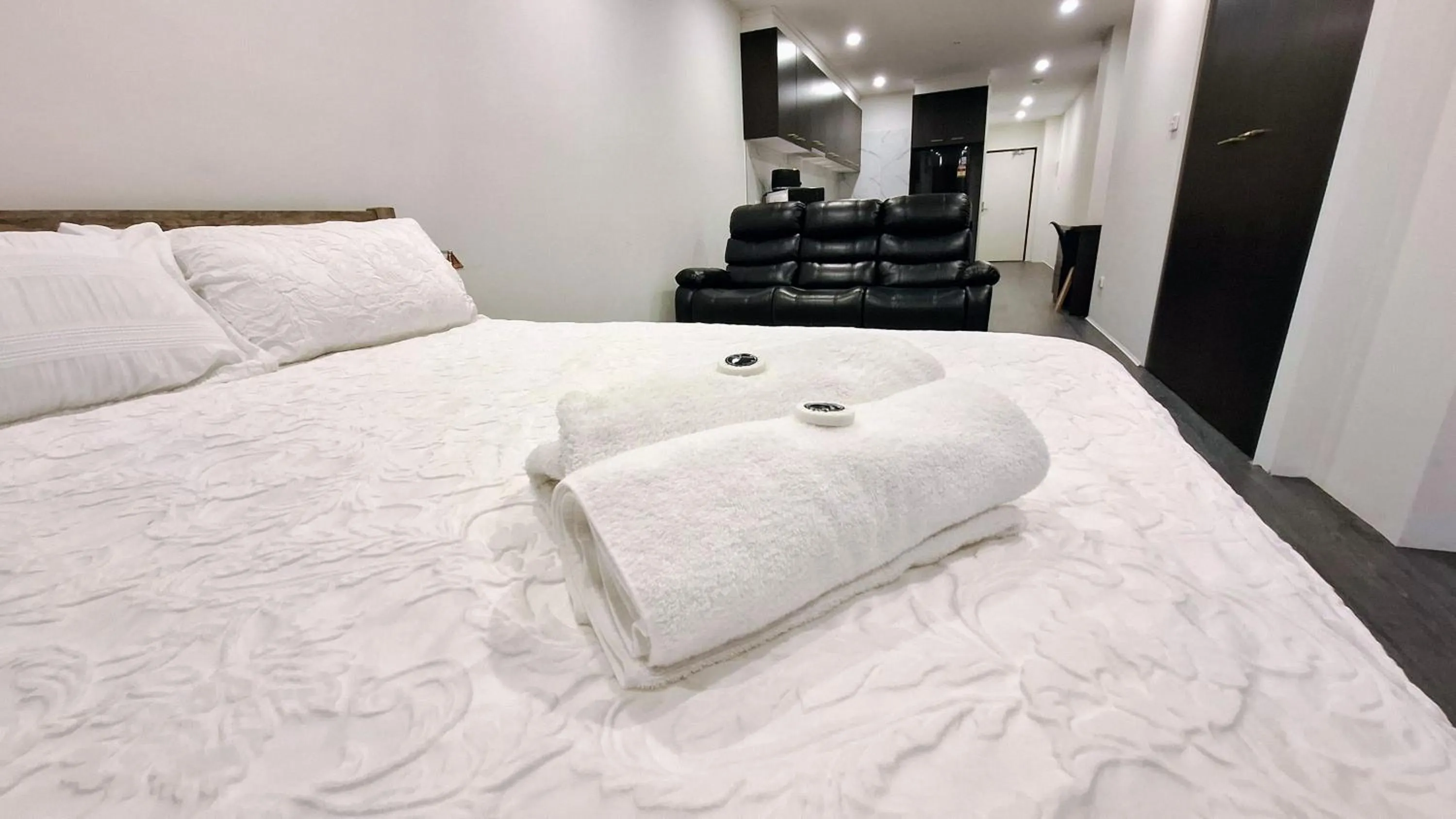 Bed in Exodus Dandenong Apartment Hotel