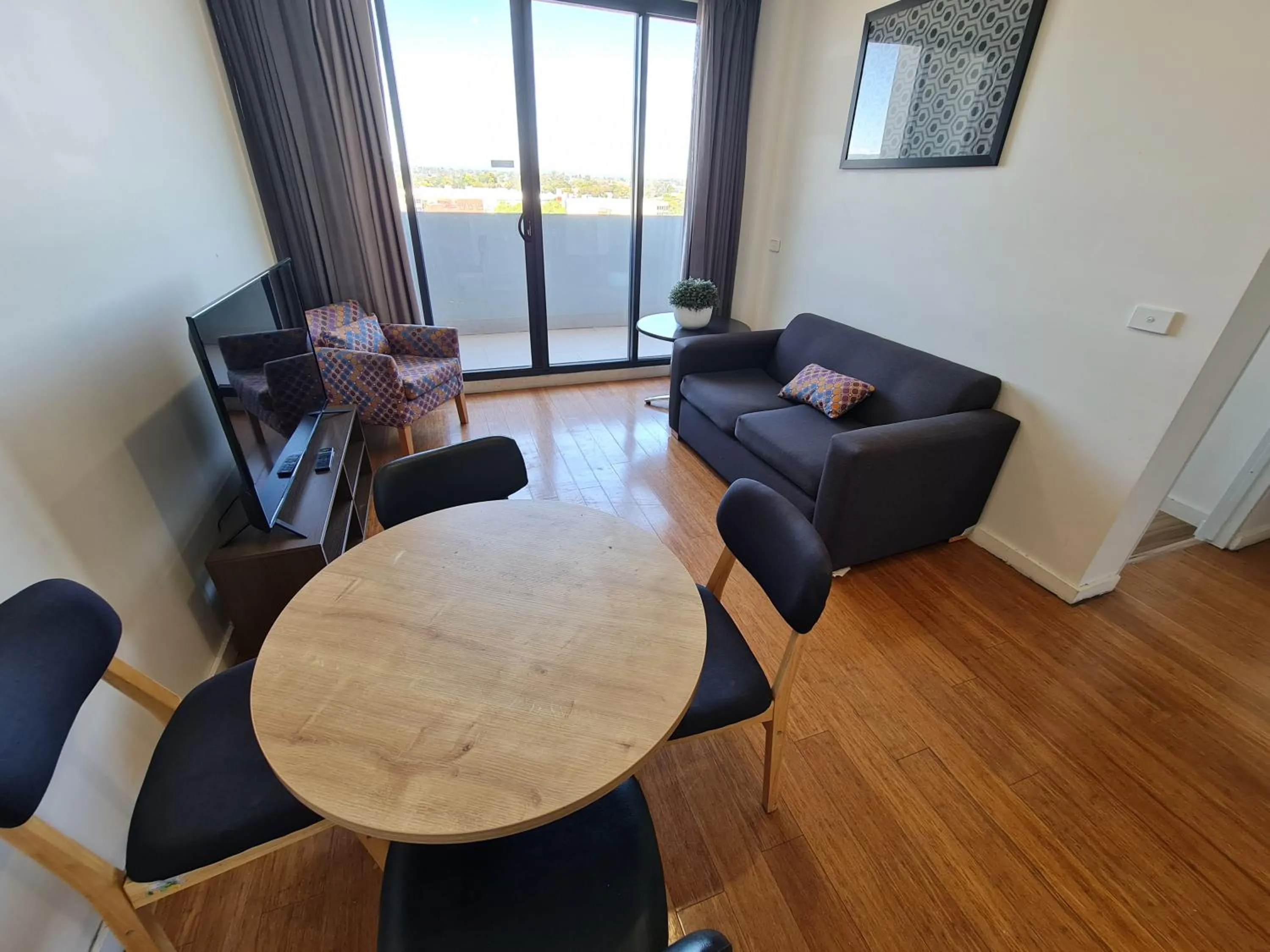 Seating area in Exodus Dandenong Apartment Hotel