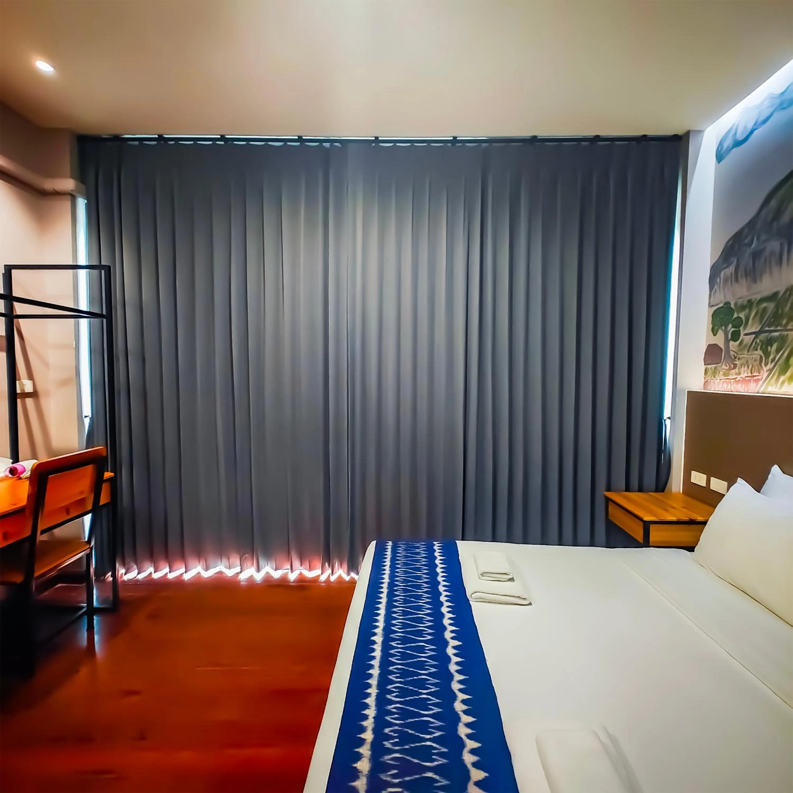 Bed in The Riva Vientiane Hotel