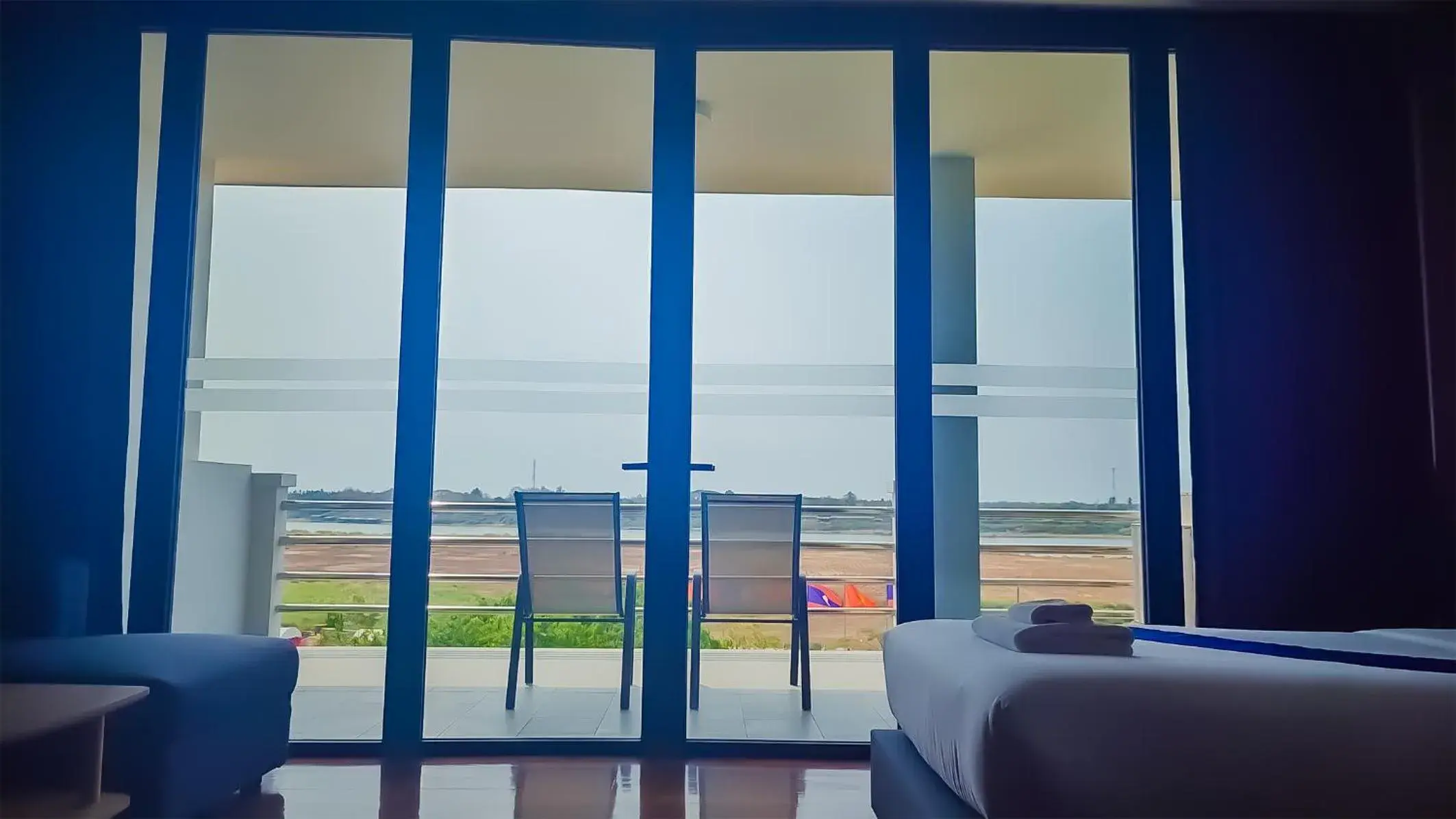 Bed in The Riva Vientiane Hotel Bed in The Riva Vientiane Hotel