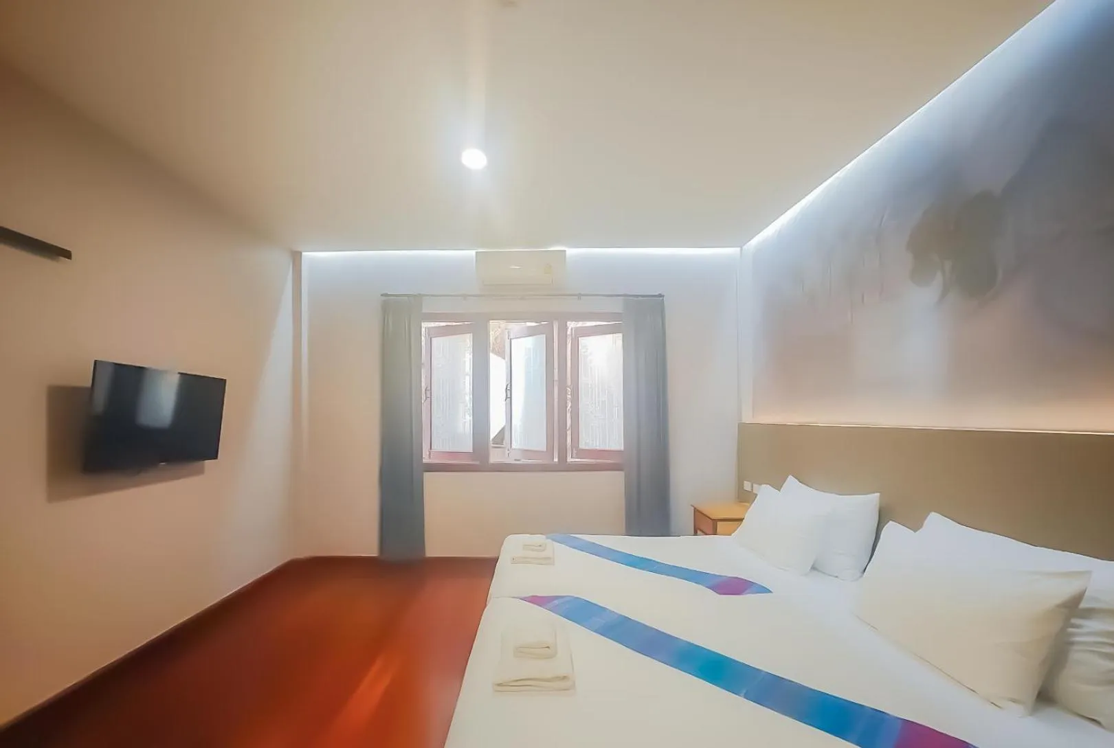 Bed in The Riva Vientiane Hotel