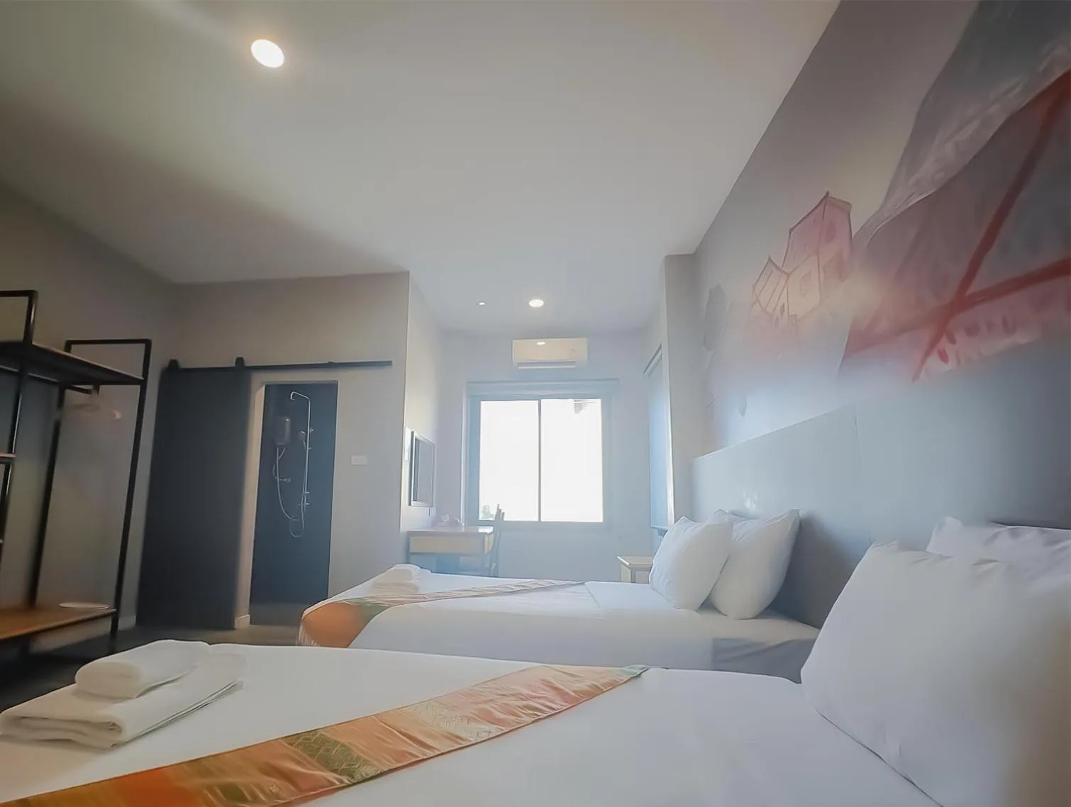 Bed in The Riva Vientiane Hotel