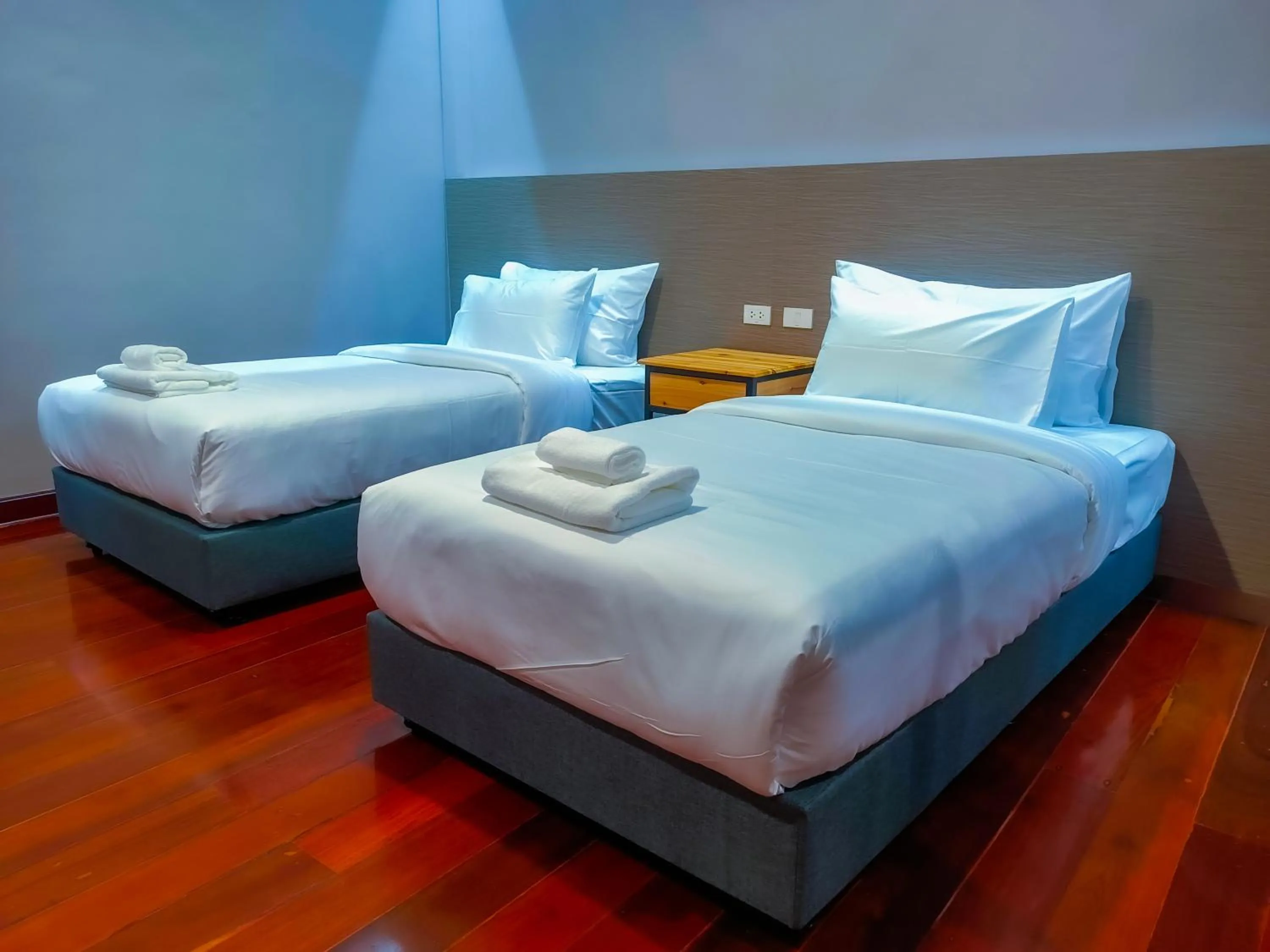 Bed in The Riva Vientiane Hotel
