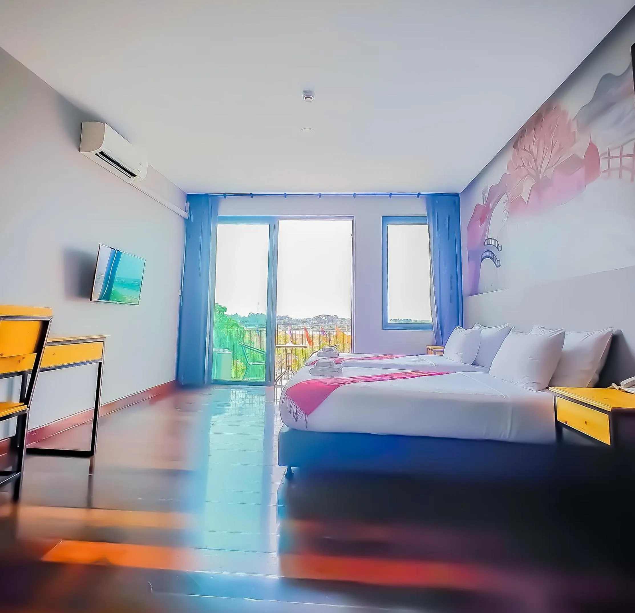 Bed in The Riva Vientiane Hotel