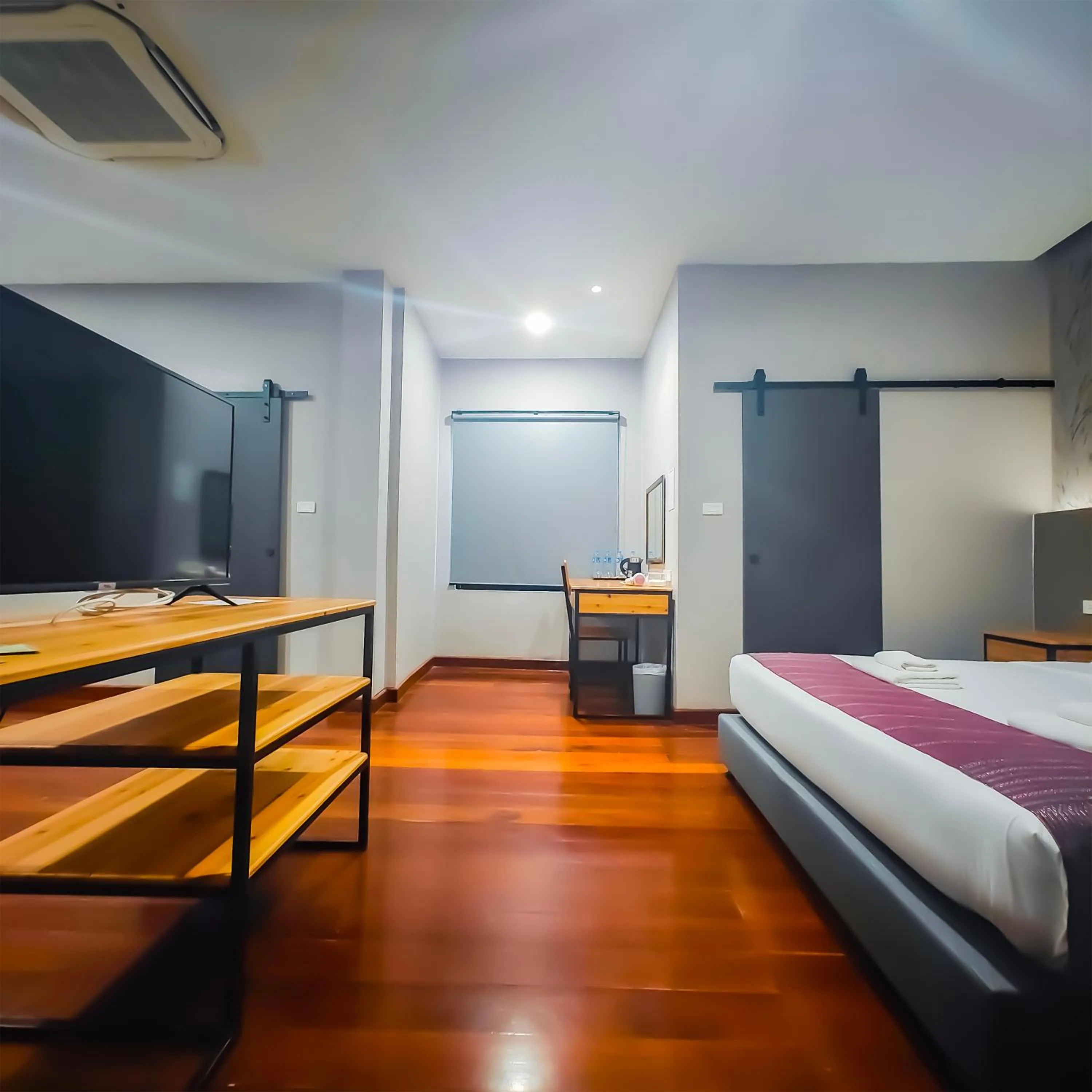 Bed in The Riva Vientiane Hotel