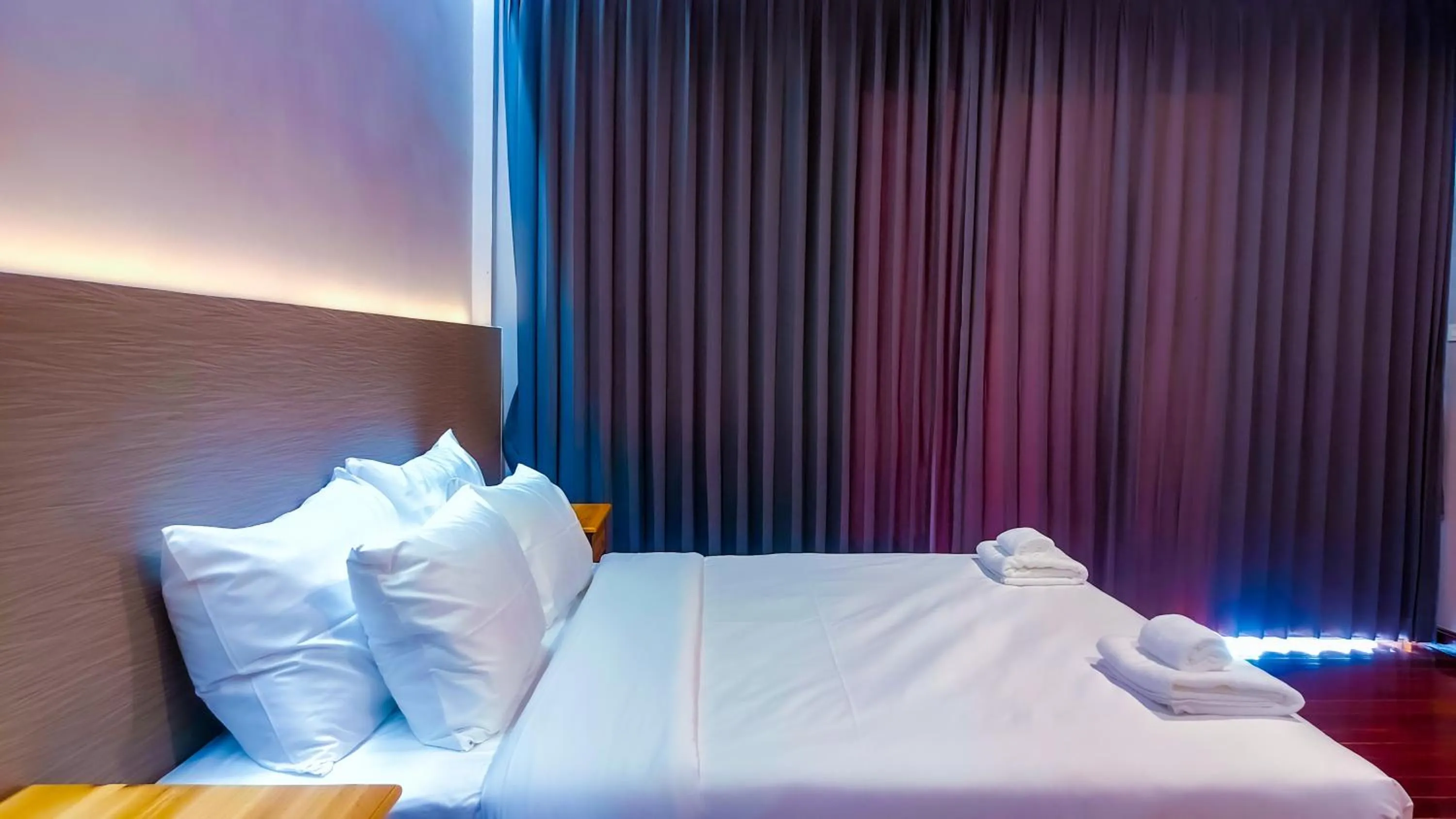 Bed in The Riva Vientiane Hotel