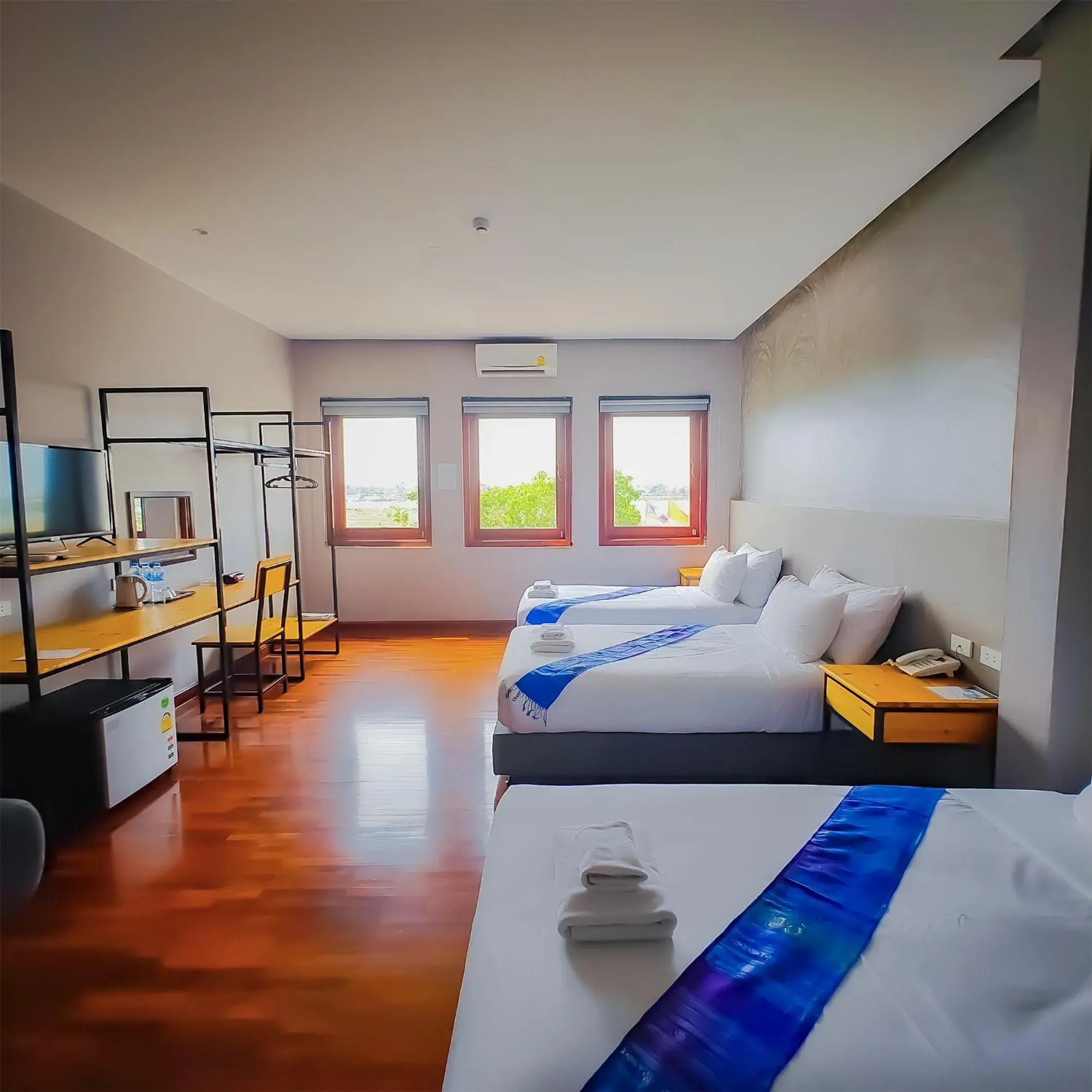 Bed in The Riva Vientiane Hotel Bed in The Riva Vientiane Hotel