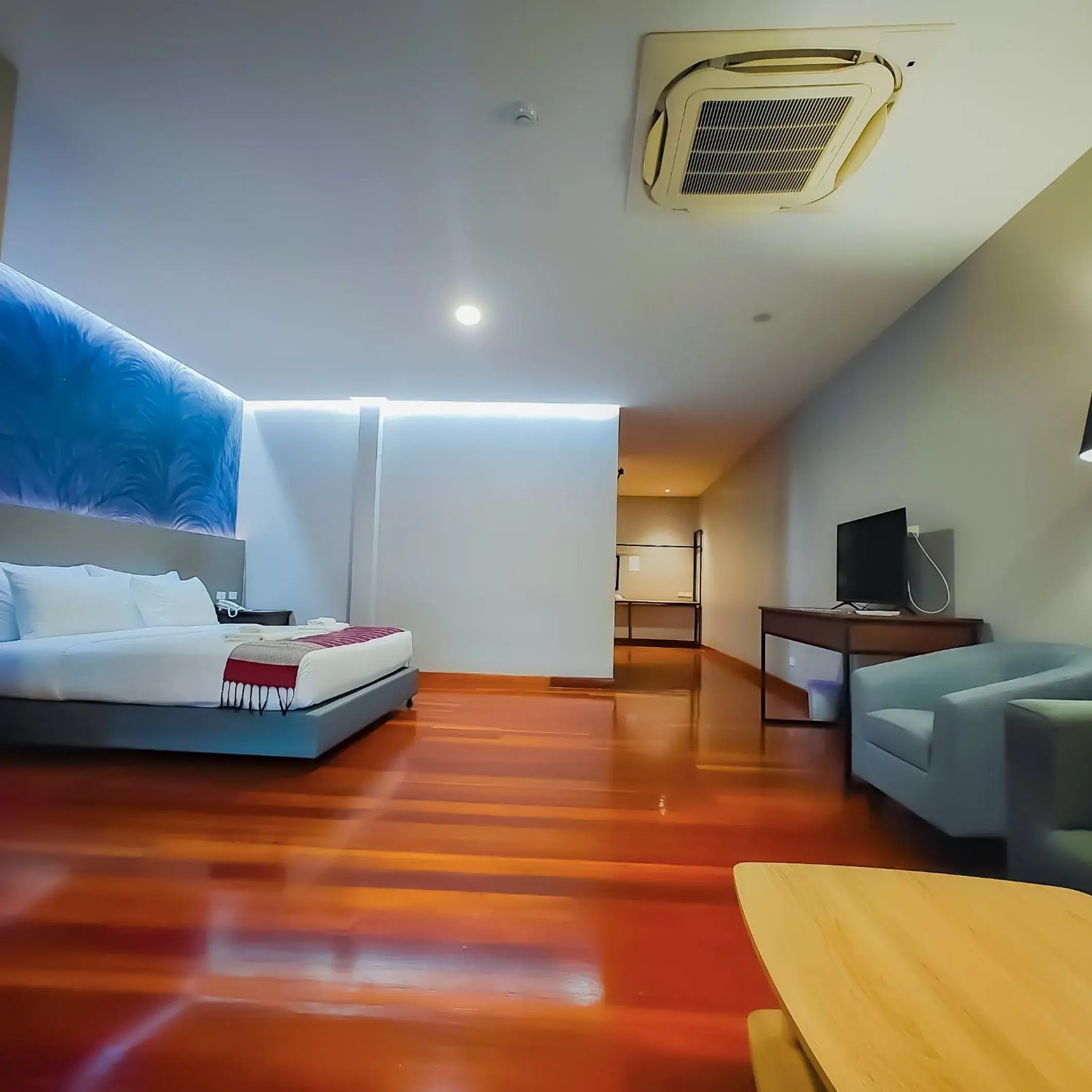 Bed in The Riva Vientiane Hotel Bed in The Riva Vientiane Hotel