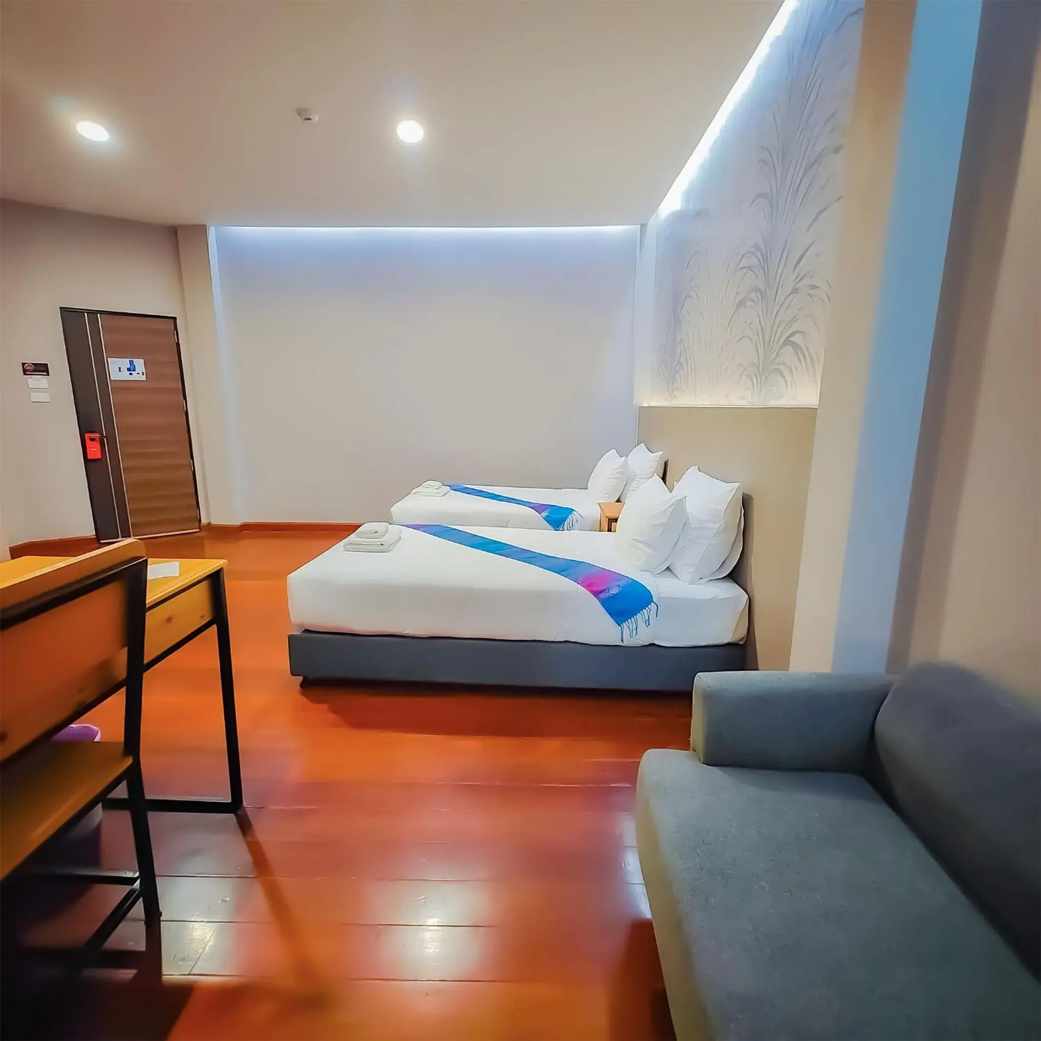 Bed in The Riva Vientiane Hotel Bed in The Riva Vientiane Hotel