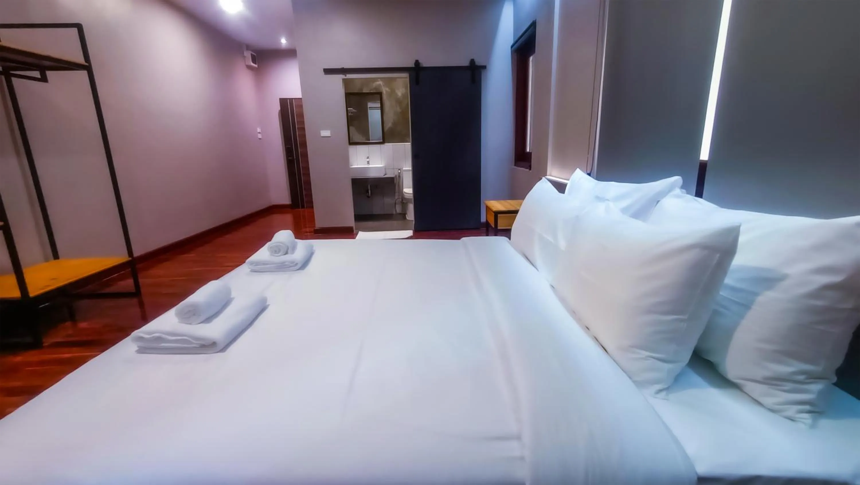 Bed in The Riva Vientiane Hotel
