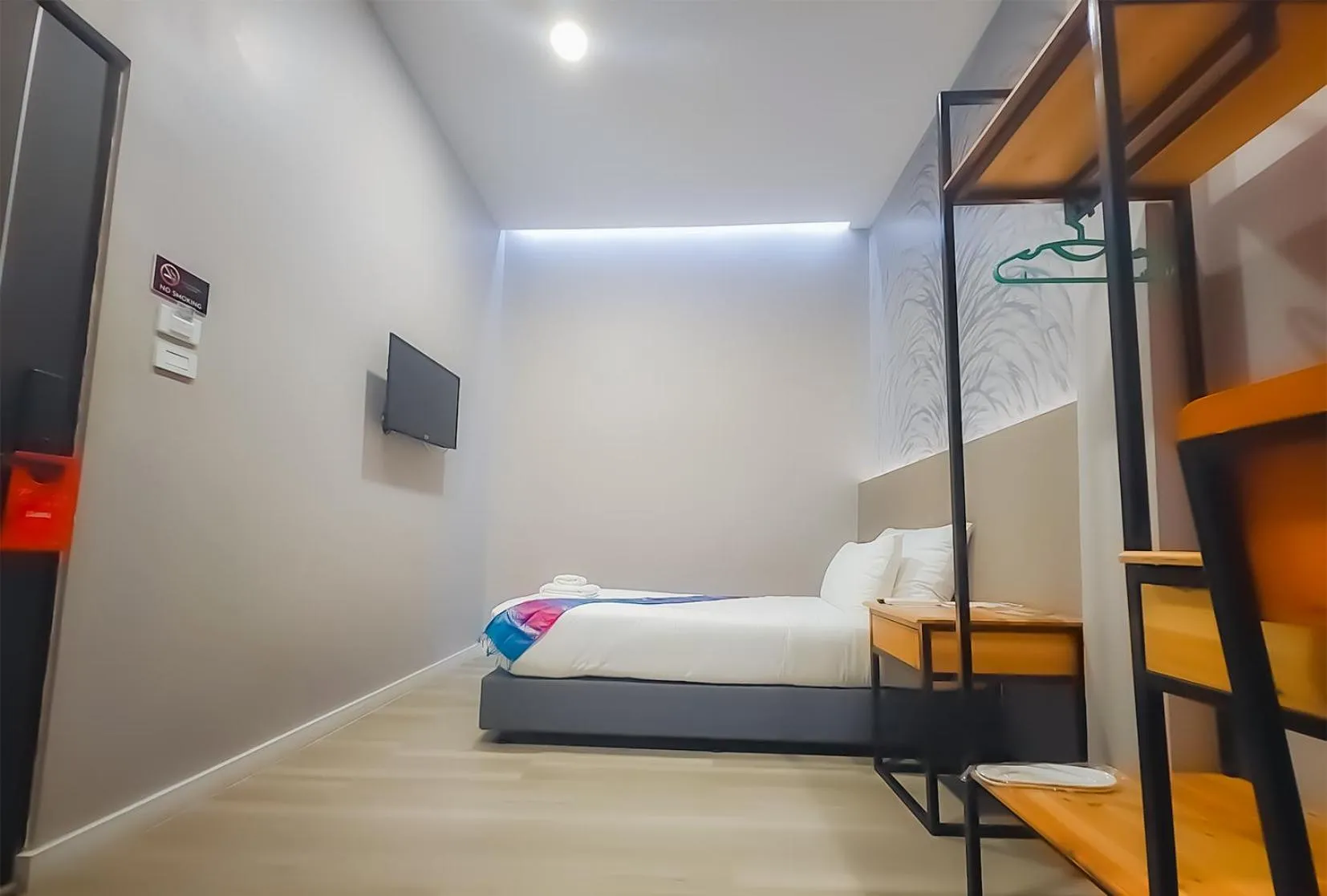 Bed in The Riva Vientiane Hotel