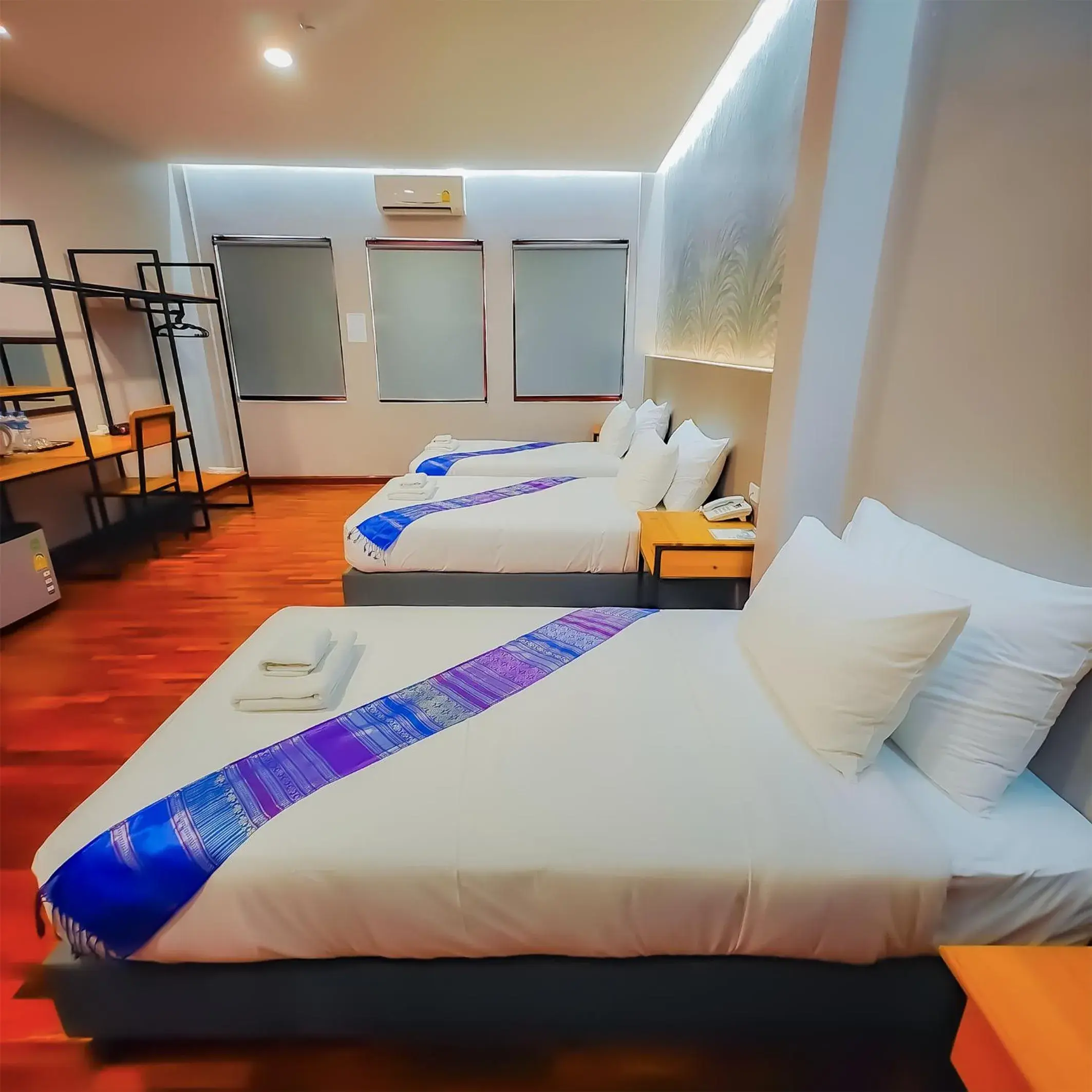 Bed in The Riva Vientiane Hotel Bed in The Riva Vientiane Hotel