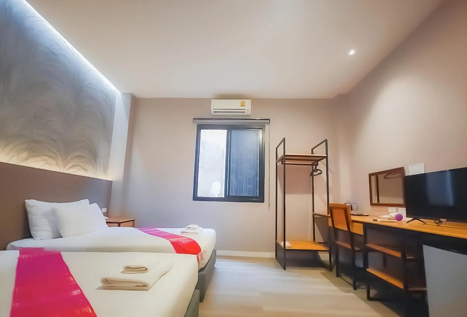 Bed in The Riva Vientiane Hotel