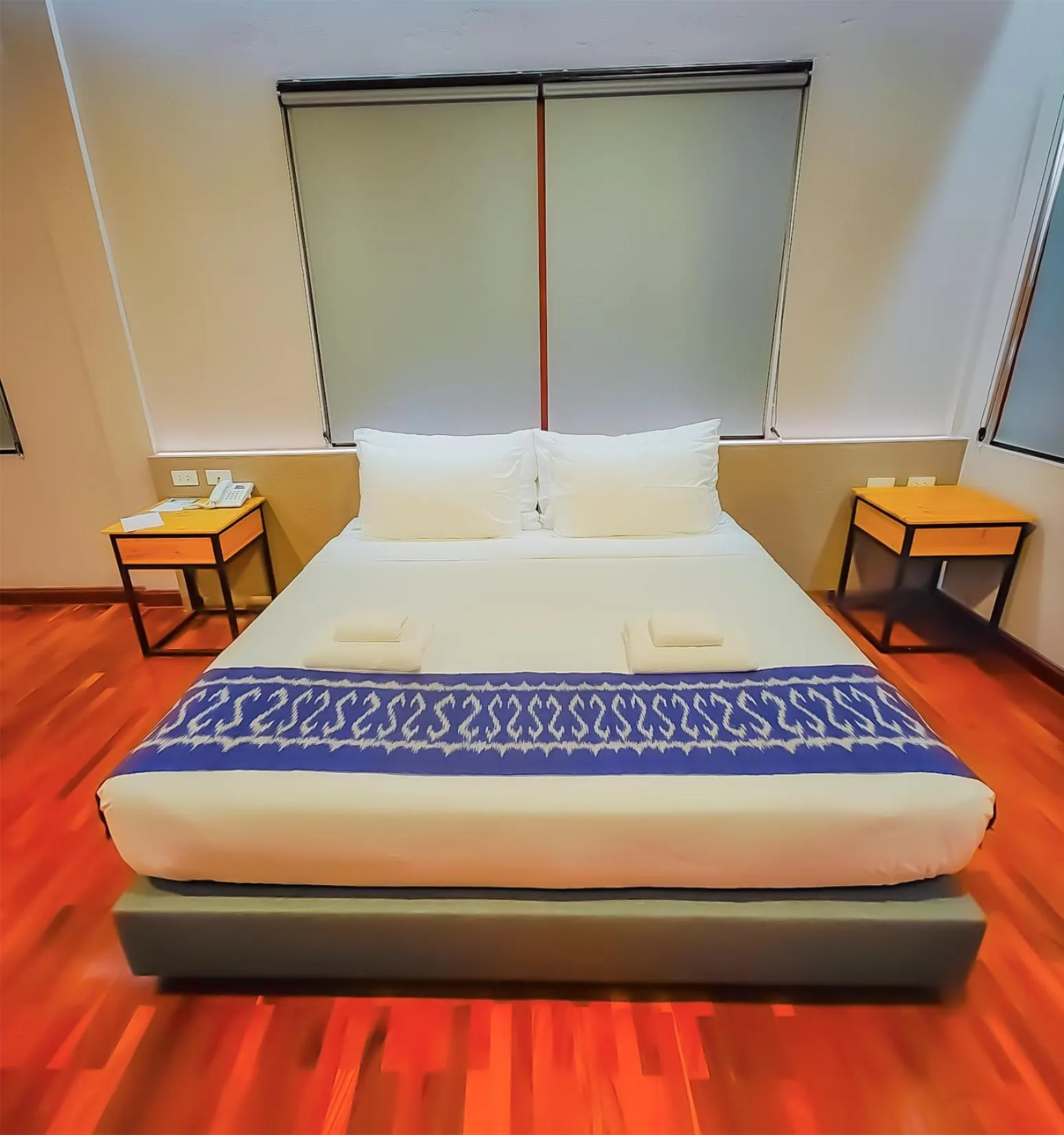 Bed in The Riva Vientiane Hotel