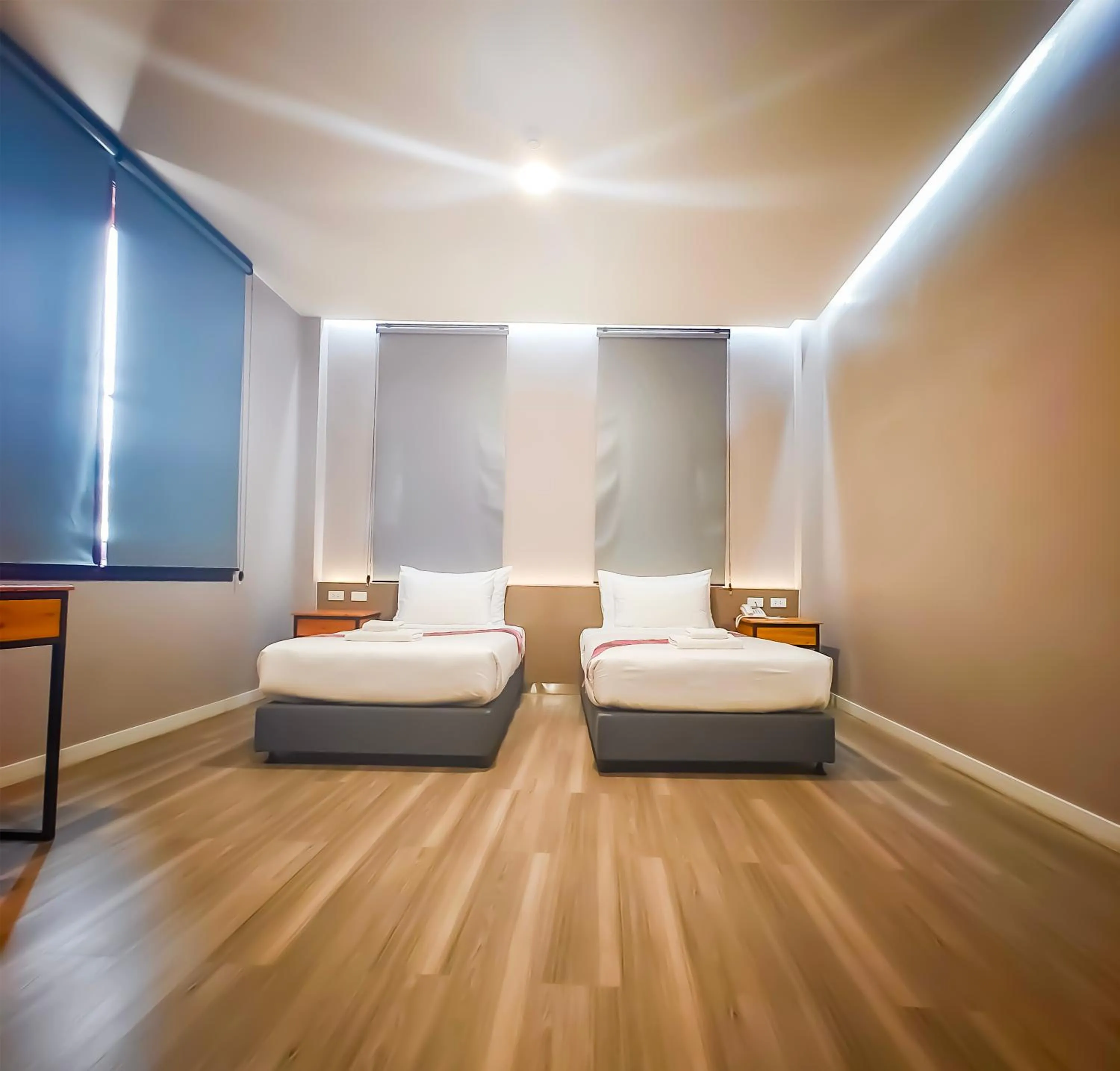 Bed in The Riva Vientiane Hotel