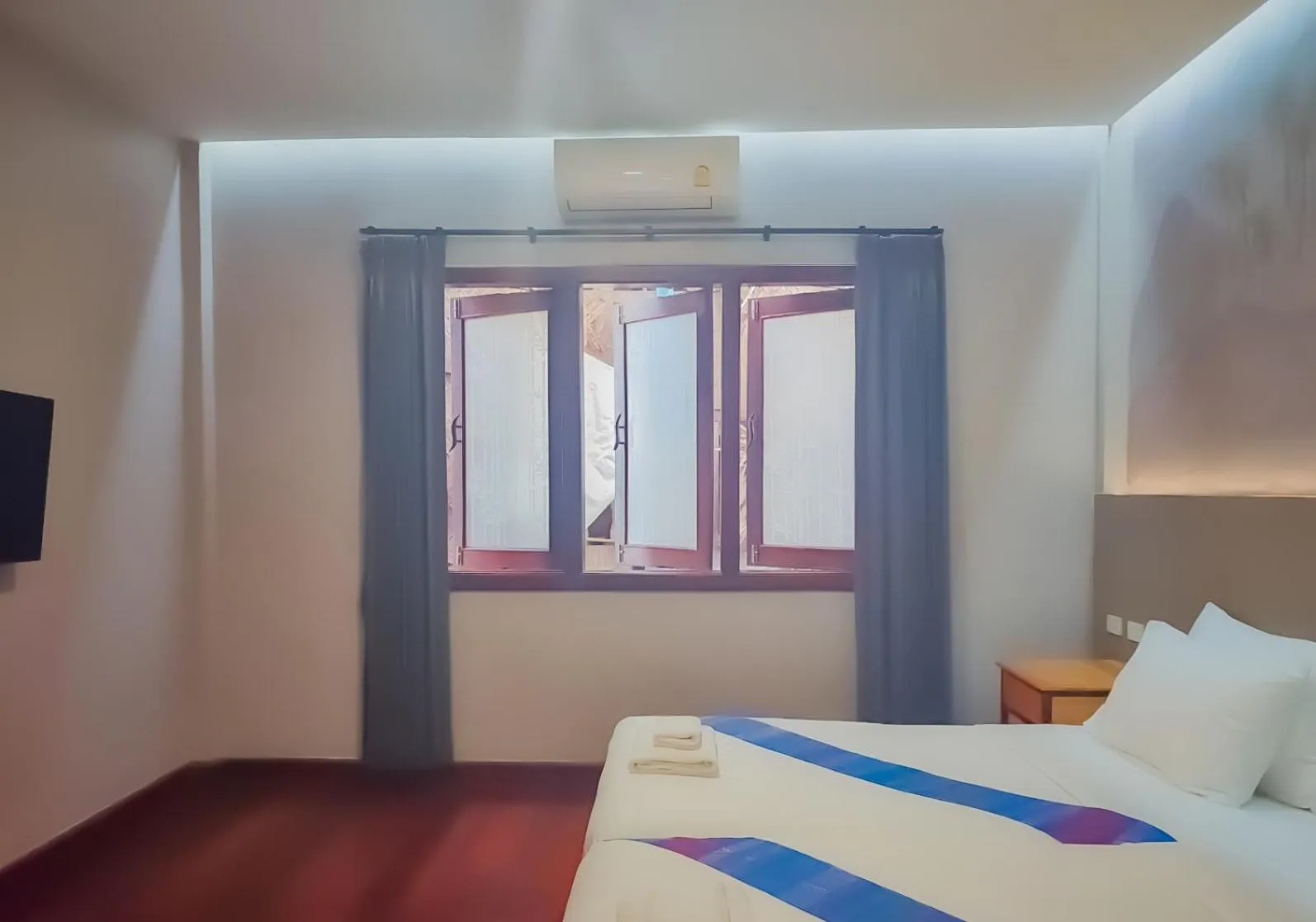 Bed in The Riva Vientiane Hotel