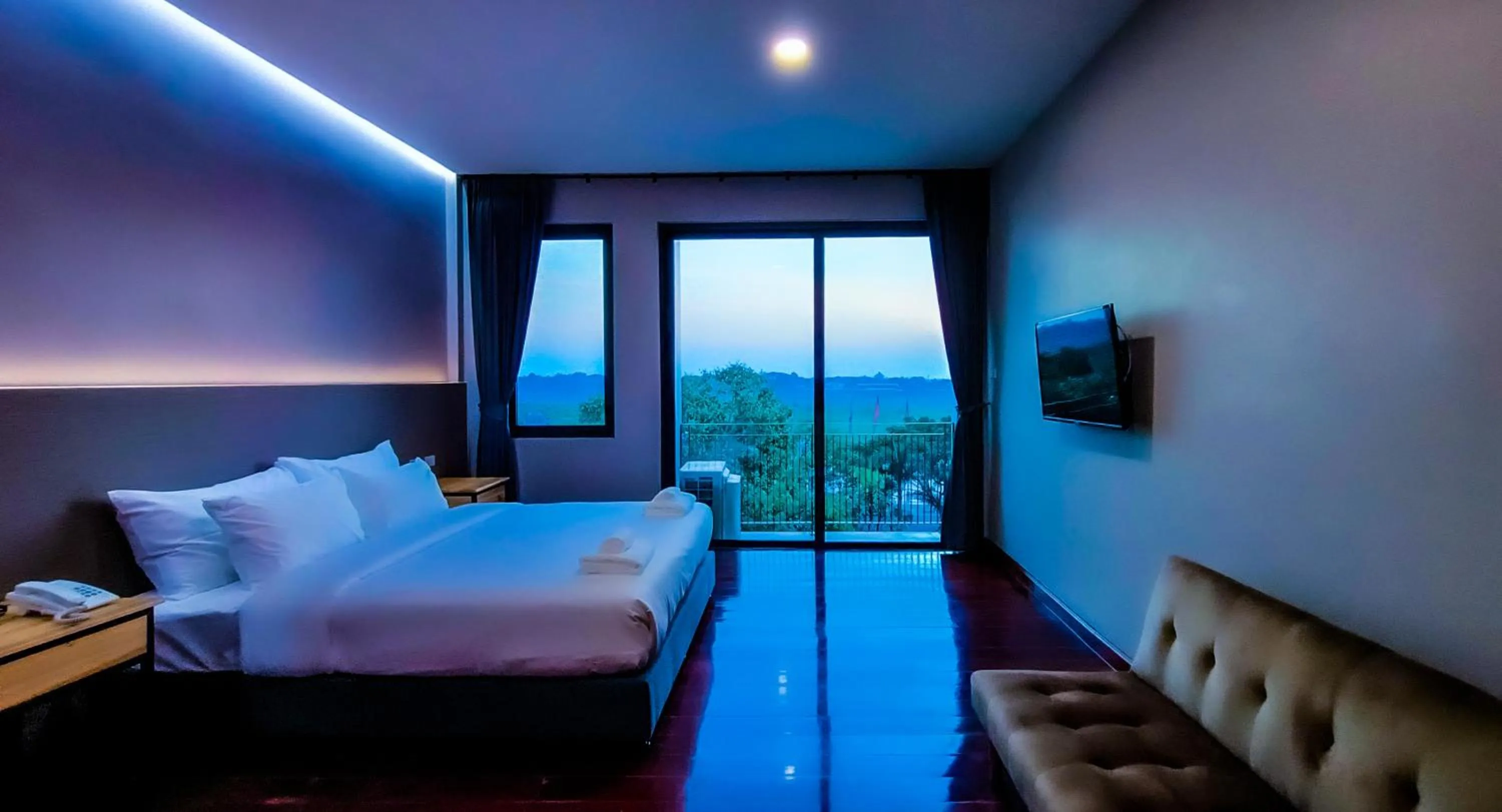 Bed in The Riva Vientiane Hotel