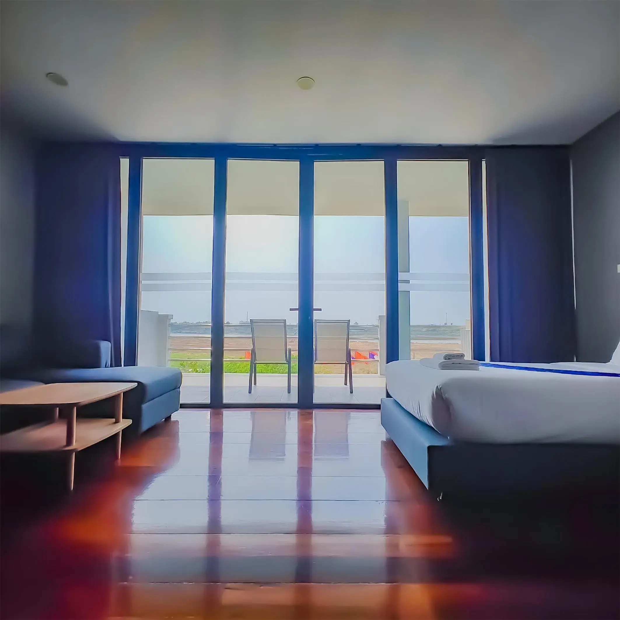 Bed in The Riva Vientiane Hotel Bed in The Riva Vientiane Hotel