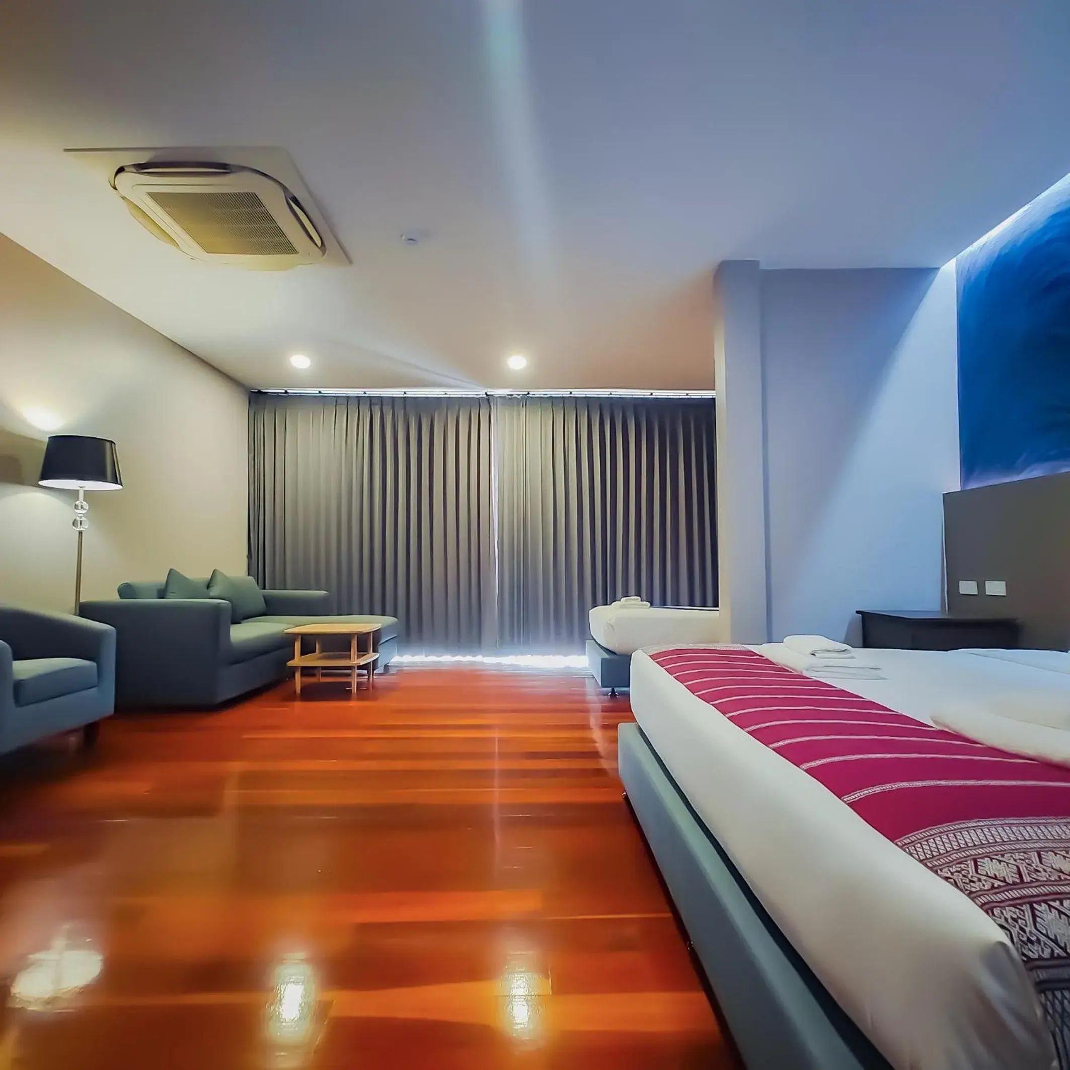 Bed in The Riva Vientiane Hotel Bed in The Riva Vientiane Hotel