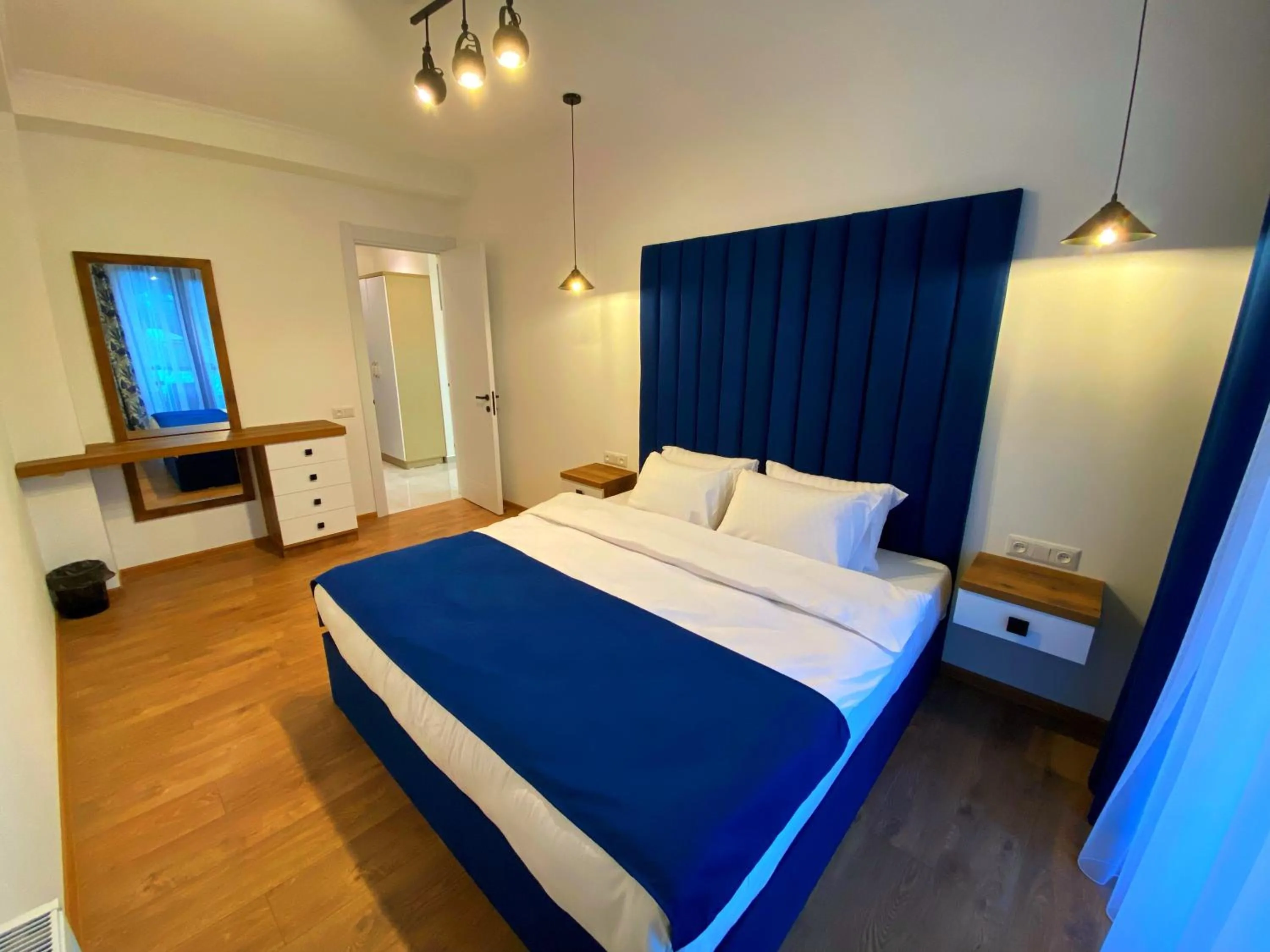 Bed in City Heart Luxury Apartment